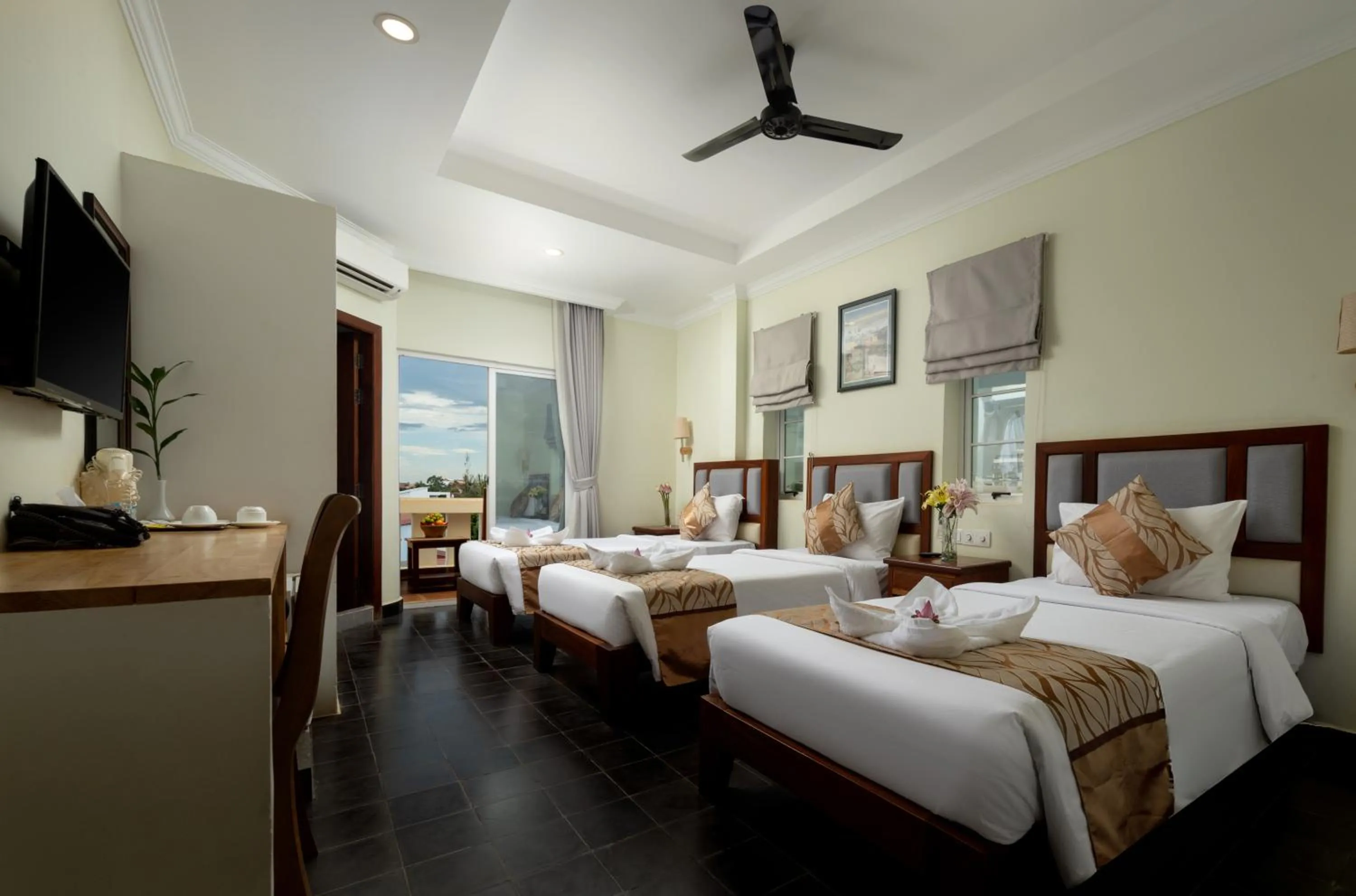 Bed in Grand Bayon Siem Reap Hotel