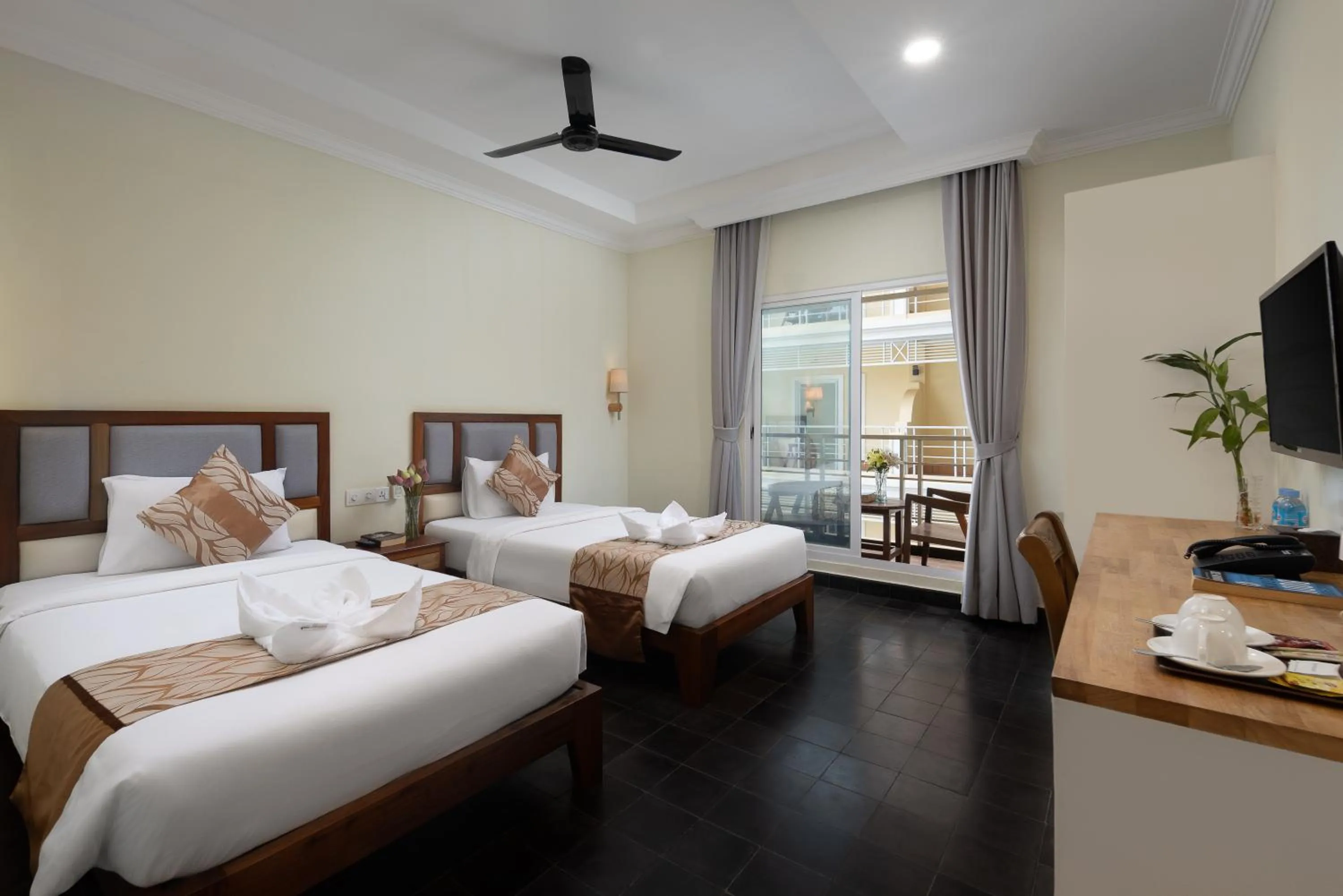 Bed in Grand Bayon Siem Reap Hotel
