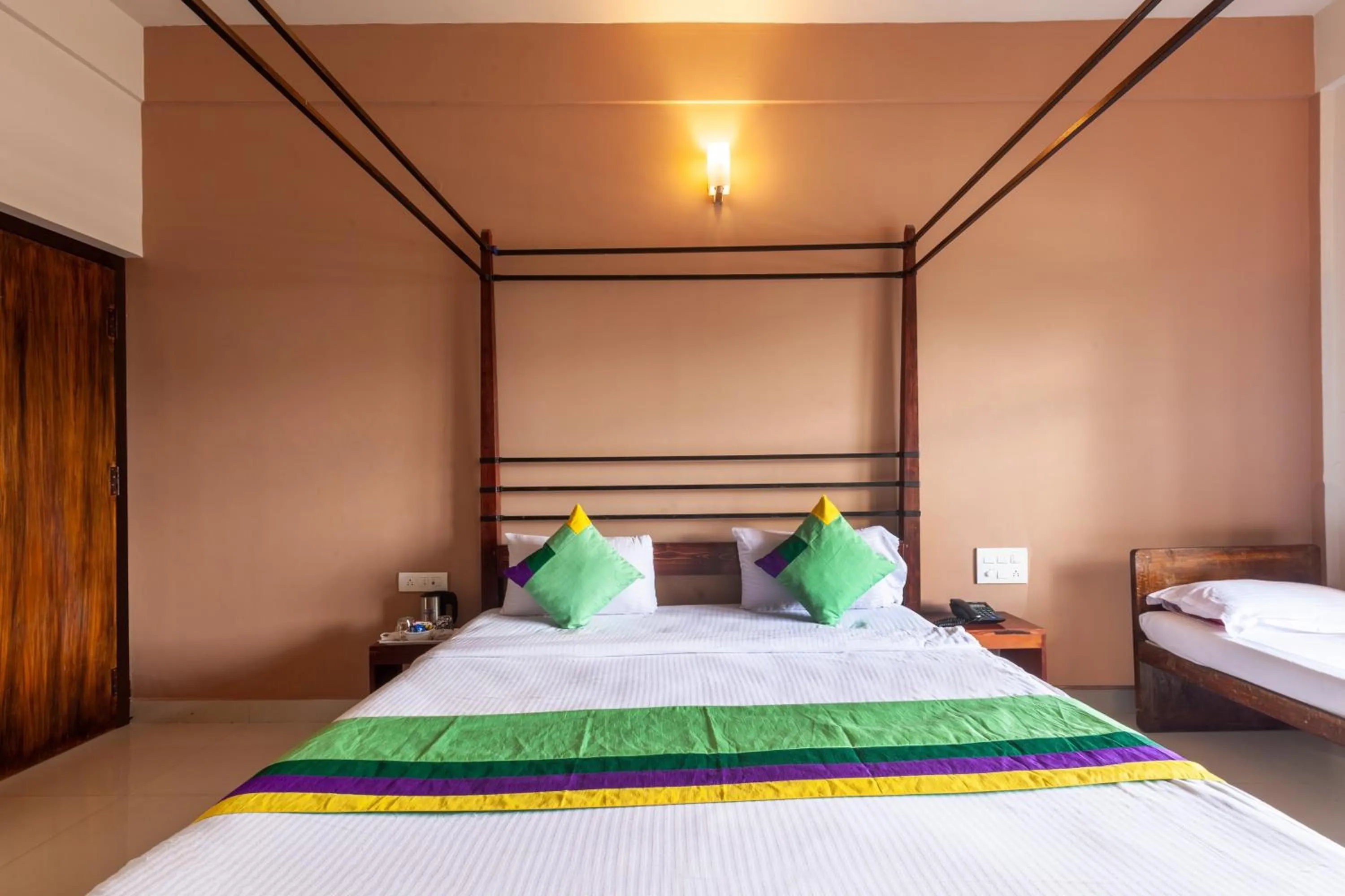 Bedroom, Bed in Treebo Vrindavan, 3 Km From Madikeri Fort