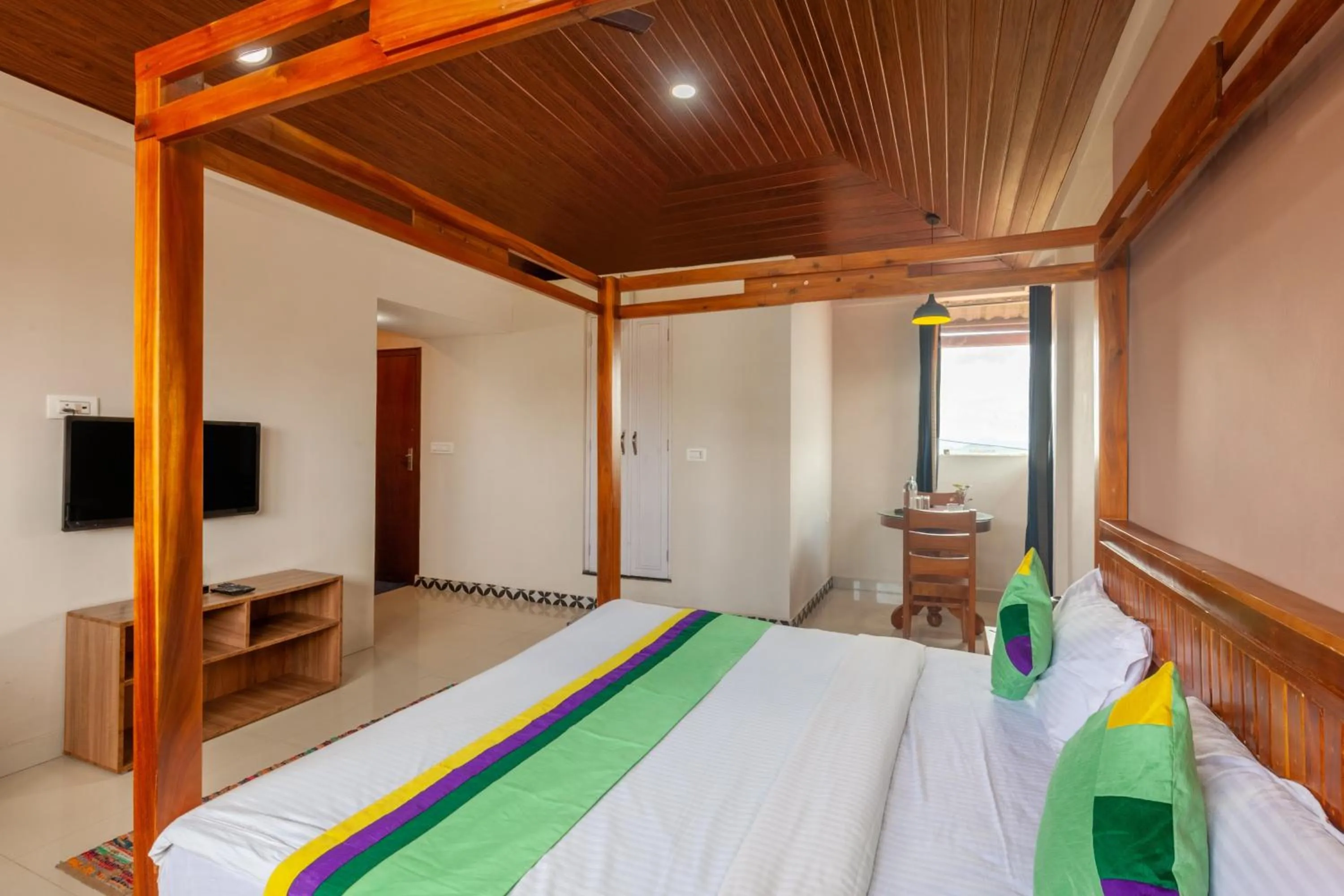Bedroom, Bed in Treebo Vrindavan, 3 Km From Madikeri Fort