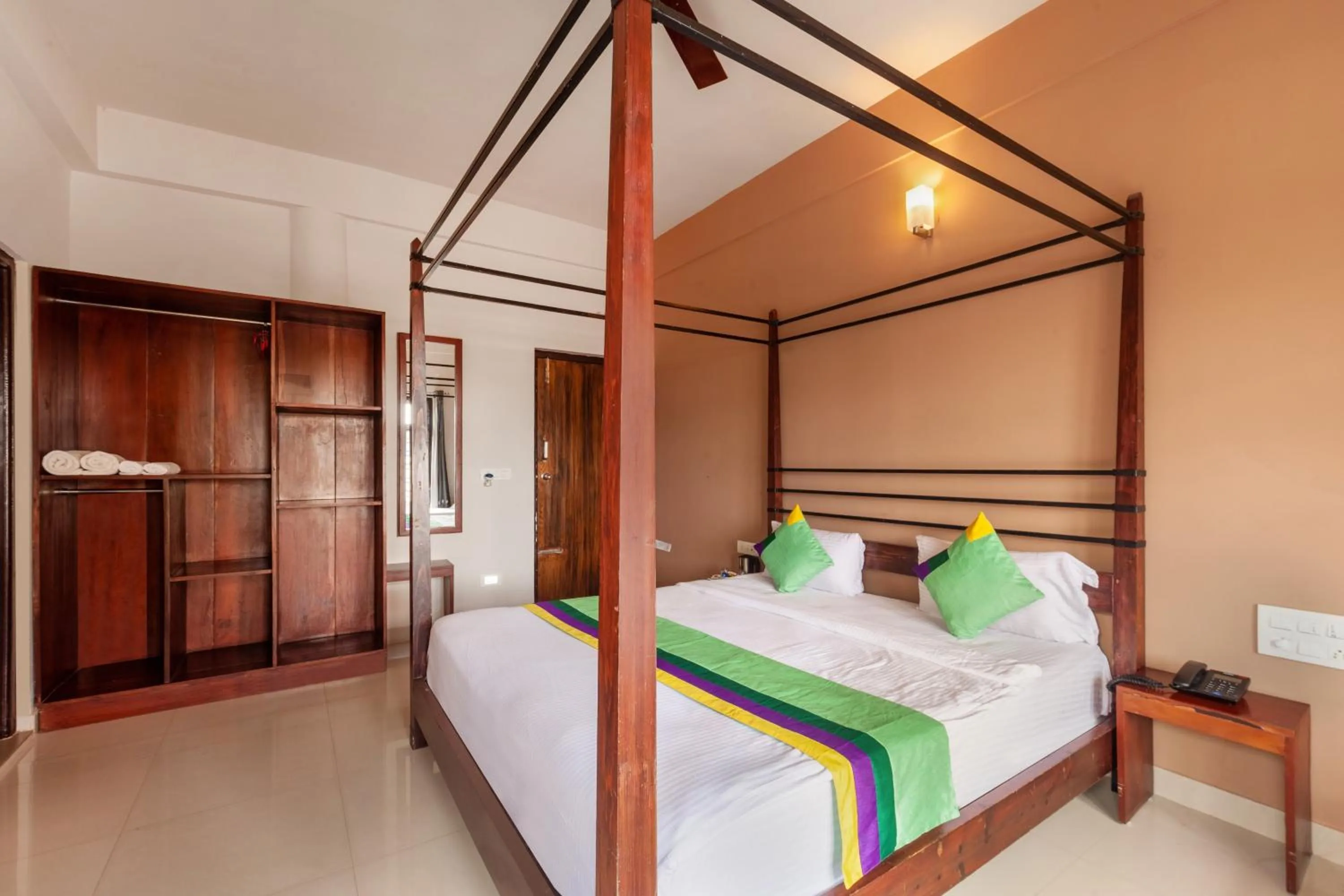 Bedroom, Bed in Treebo Vrindavan, 3 Km From Madikeri Fort