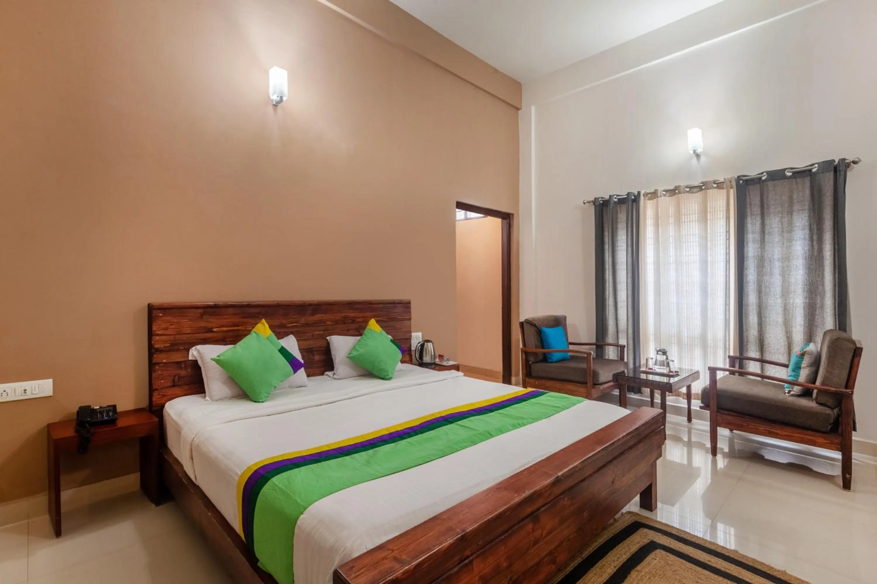 Bedroom, Bed in Treebo Vrindavan, 3 Km From Madikeri Fort