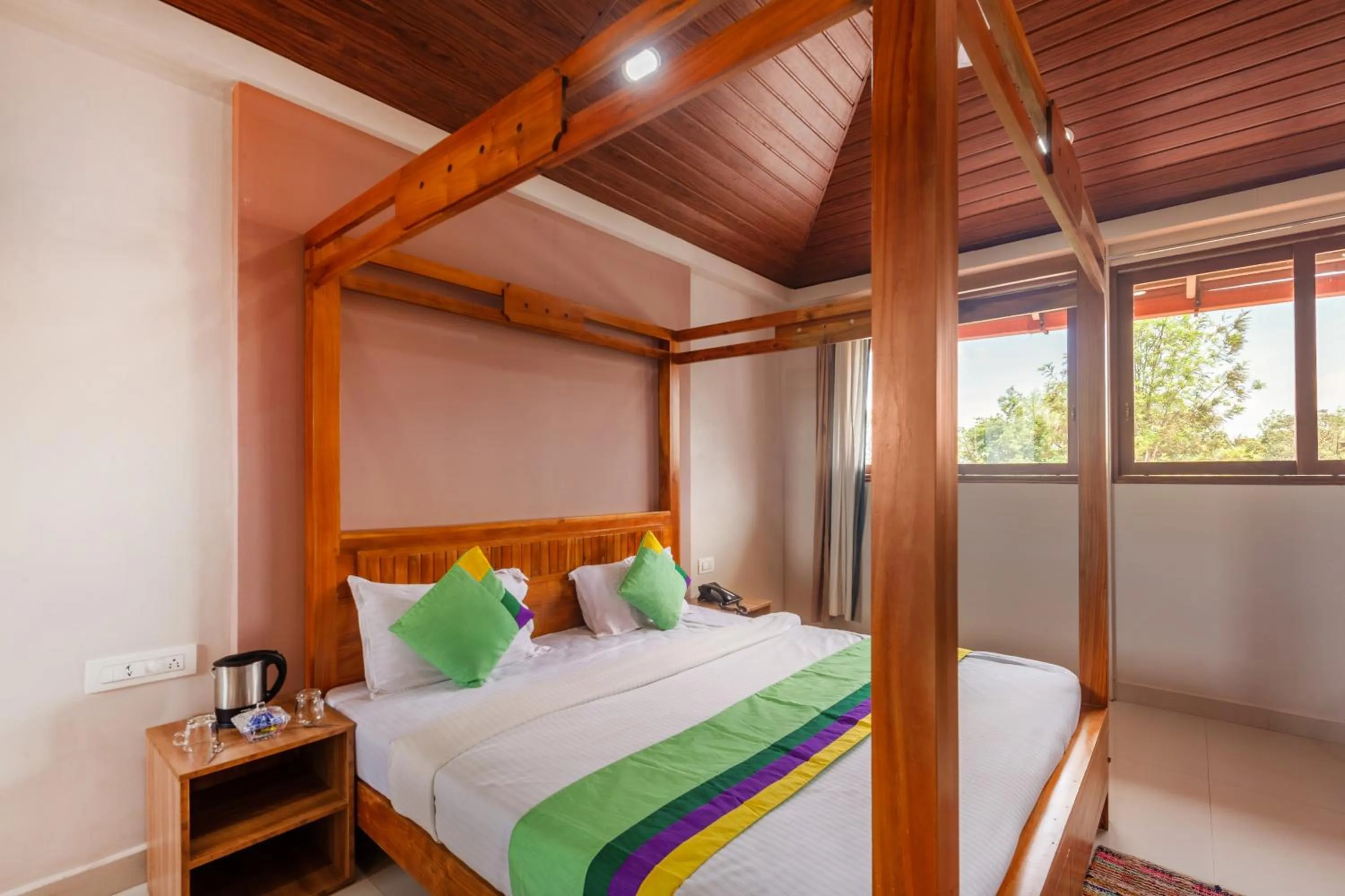 Bedroom, Bed in Treebo Vrindavan, 3 Km From Madikeri Fort