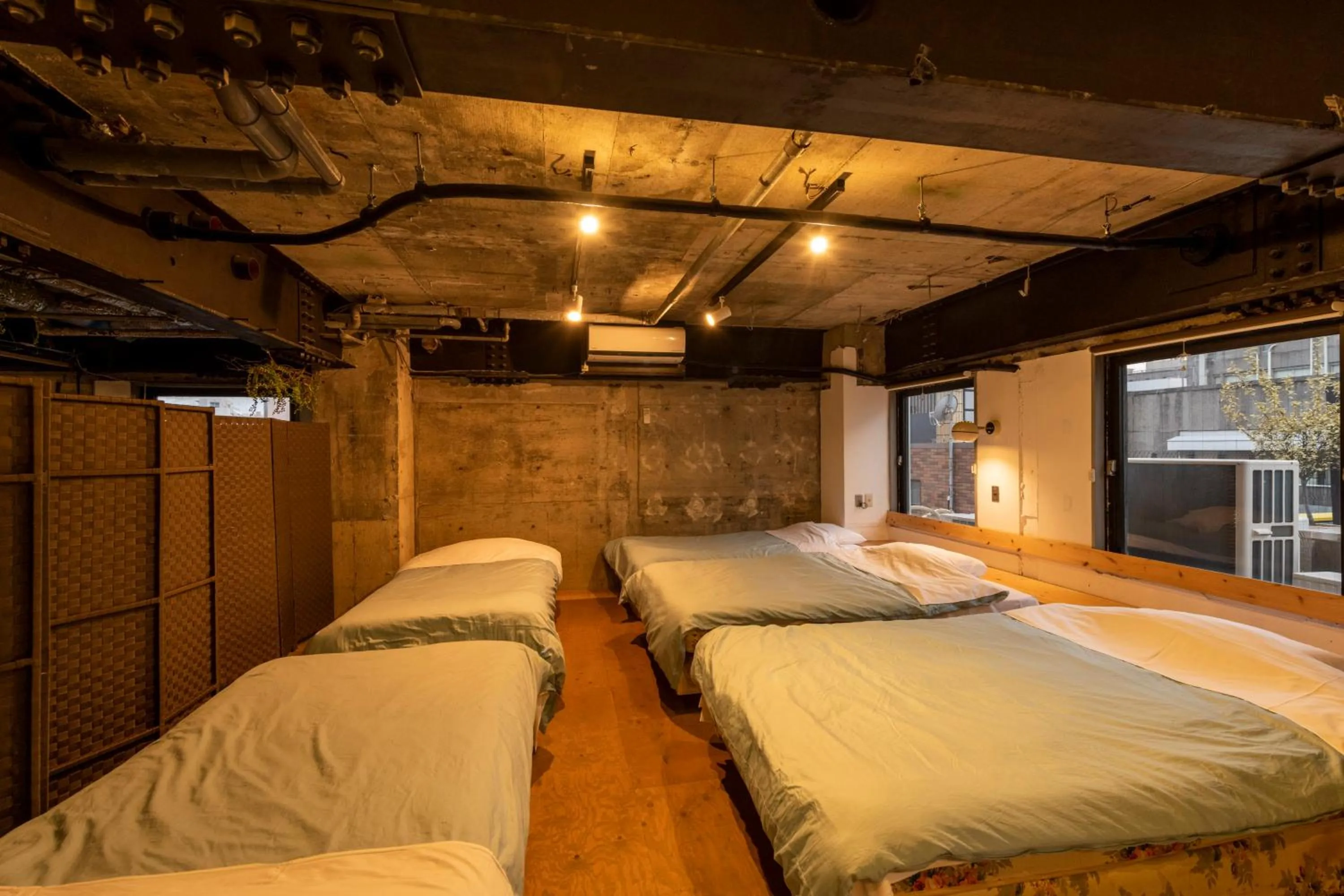 Bed in Guest House M104 Kagoshima