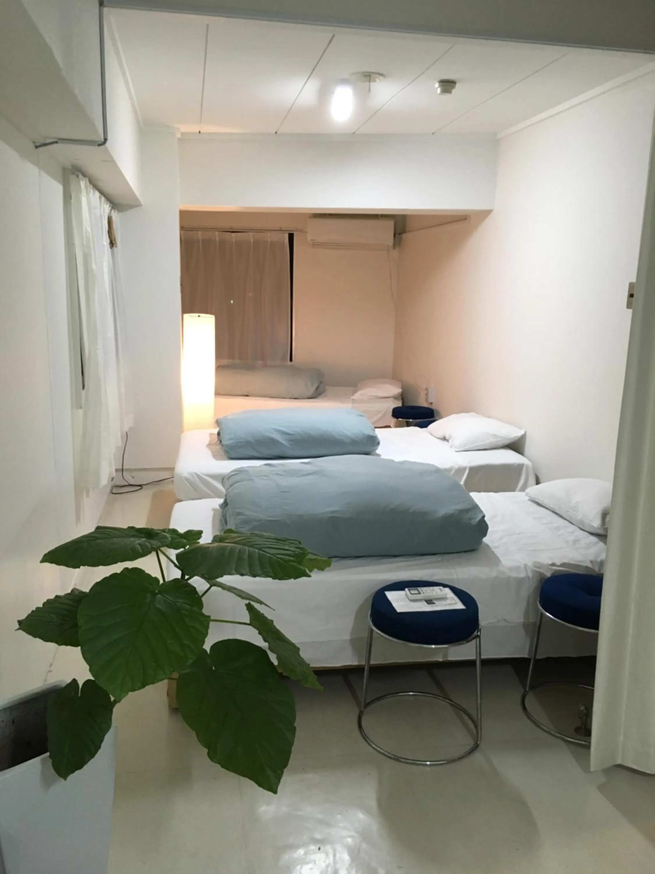 Bed in Guest House M104 Kagoshima