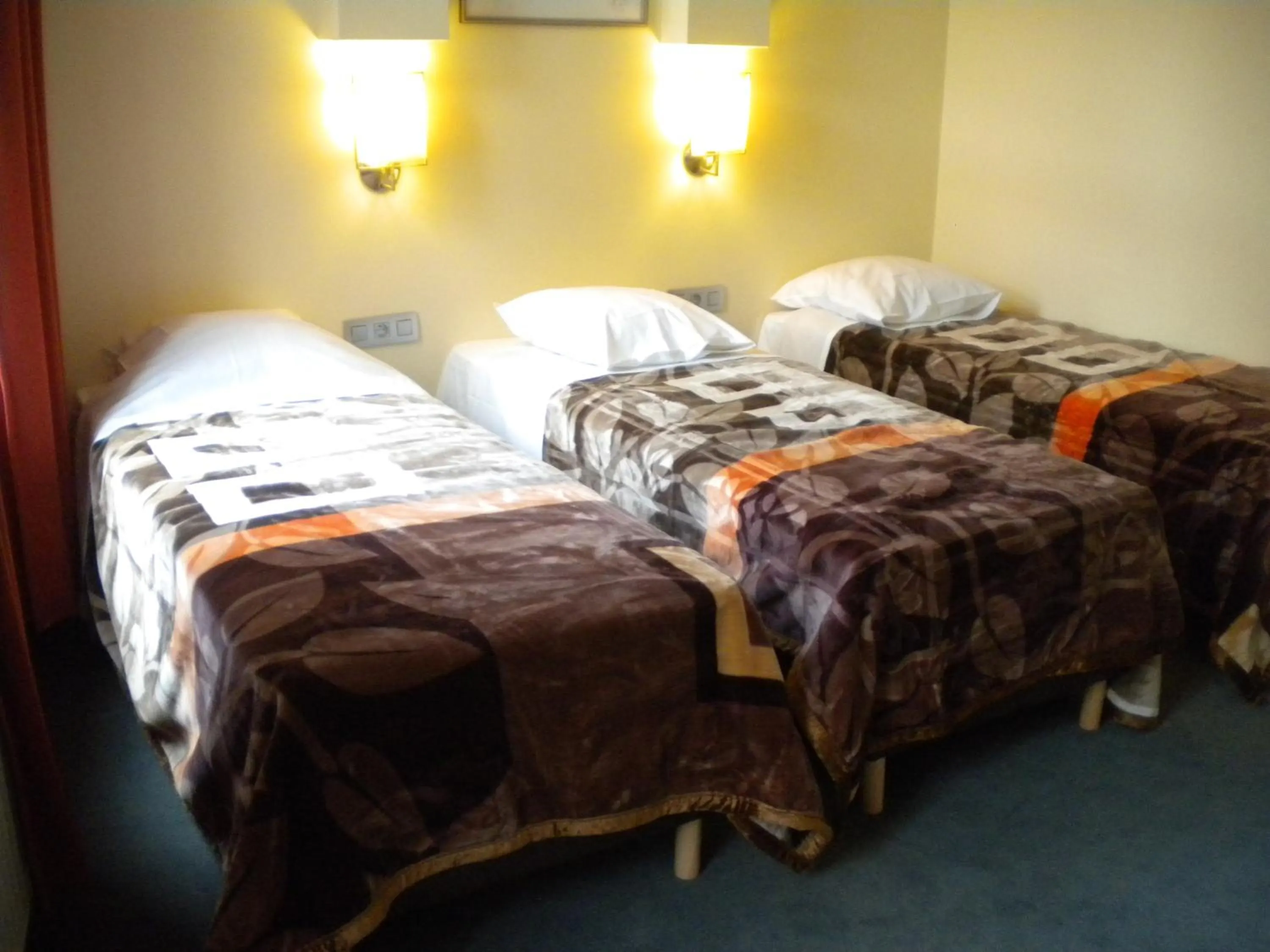 Bed in Hotel Queen Mary