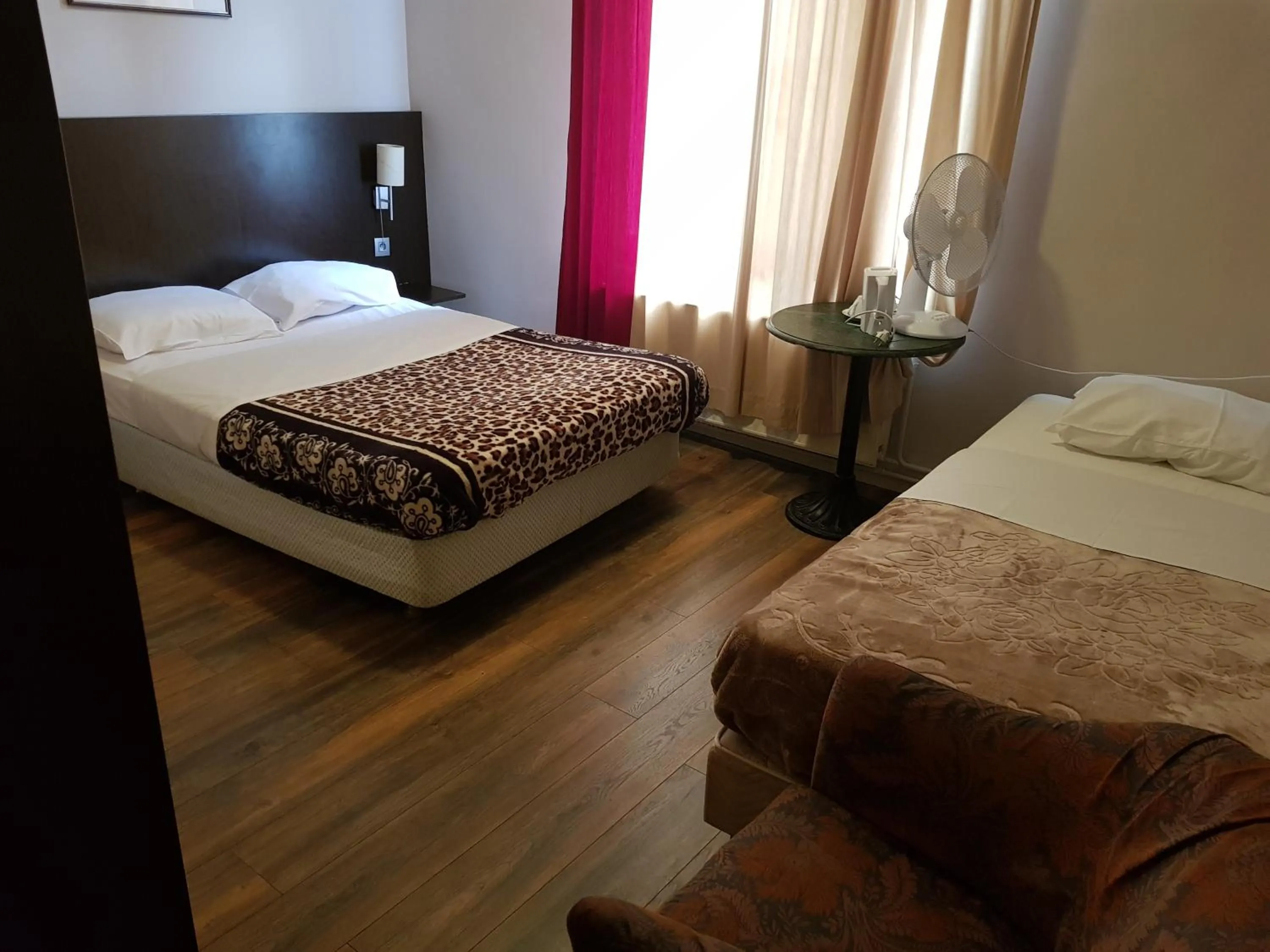 Bed in Hotel Queen Mary