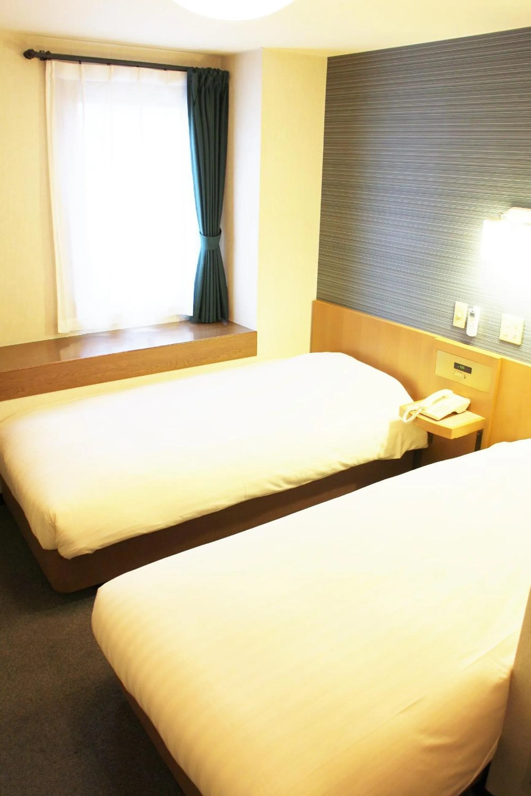 Photo of the whole room, Bed in Business Hotel Raicho
