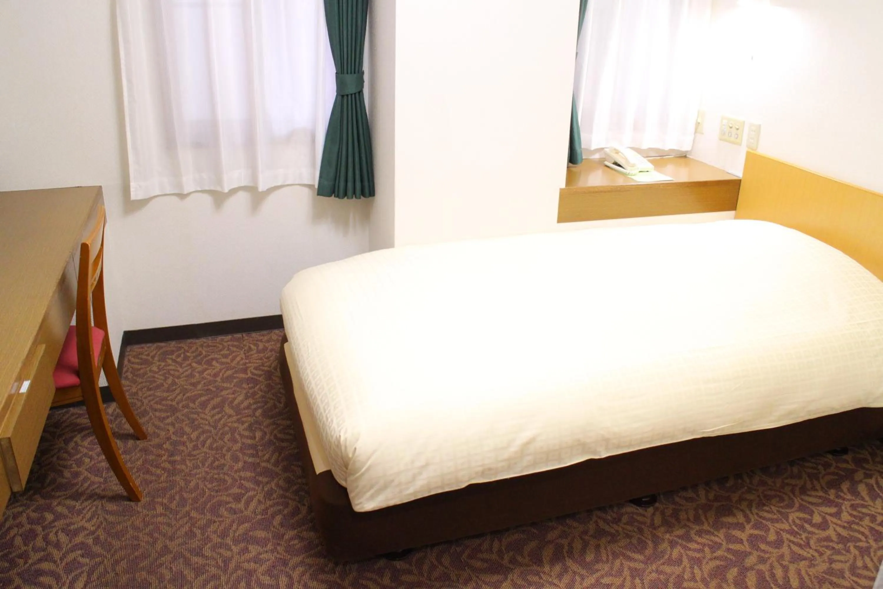 Photo of the whole room, Bed in Business Hotel Raicho