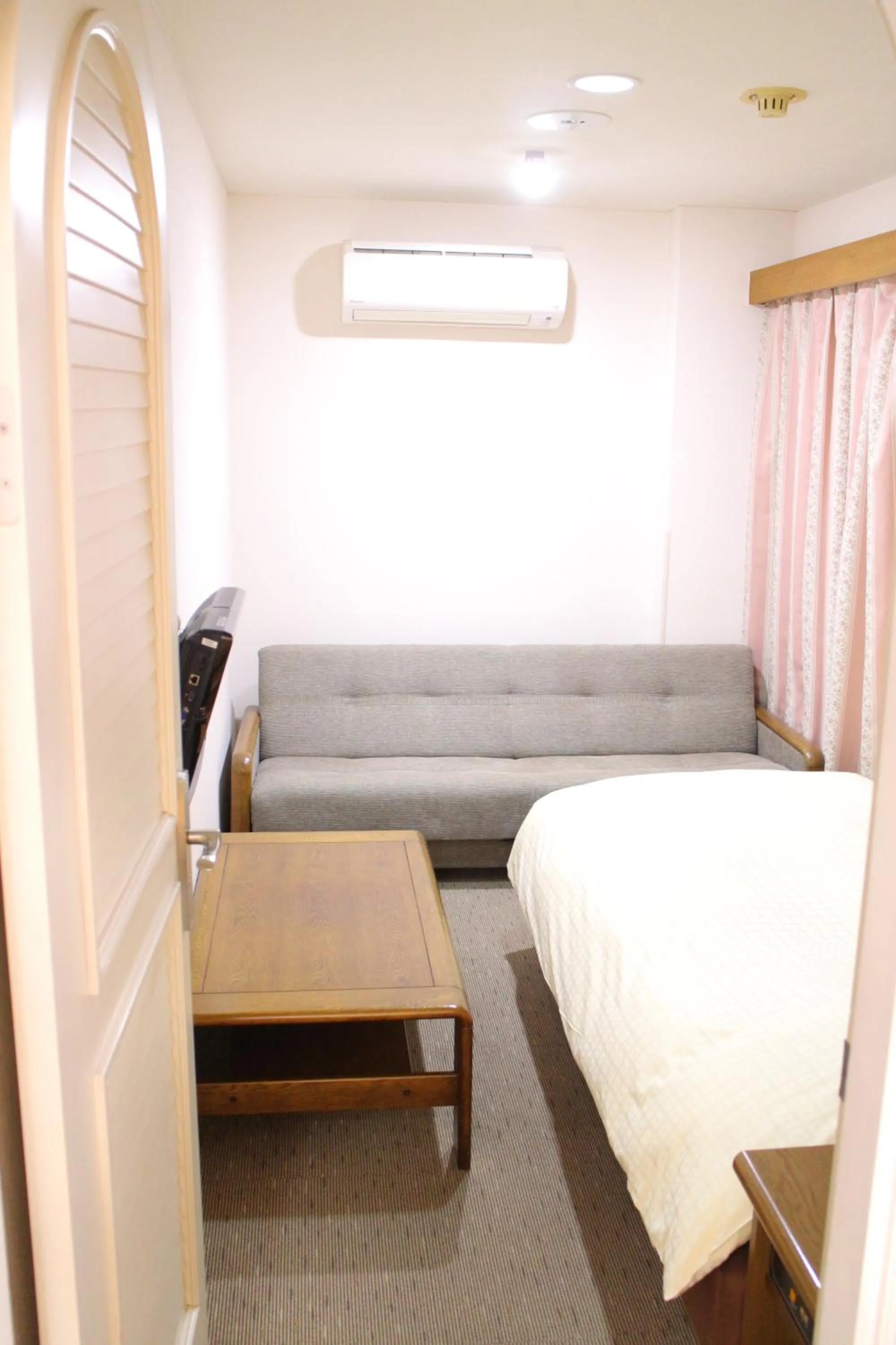 Photo of the whole room, Bed in Business Hotel Raicho