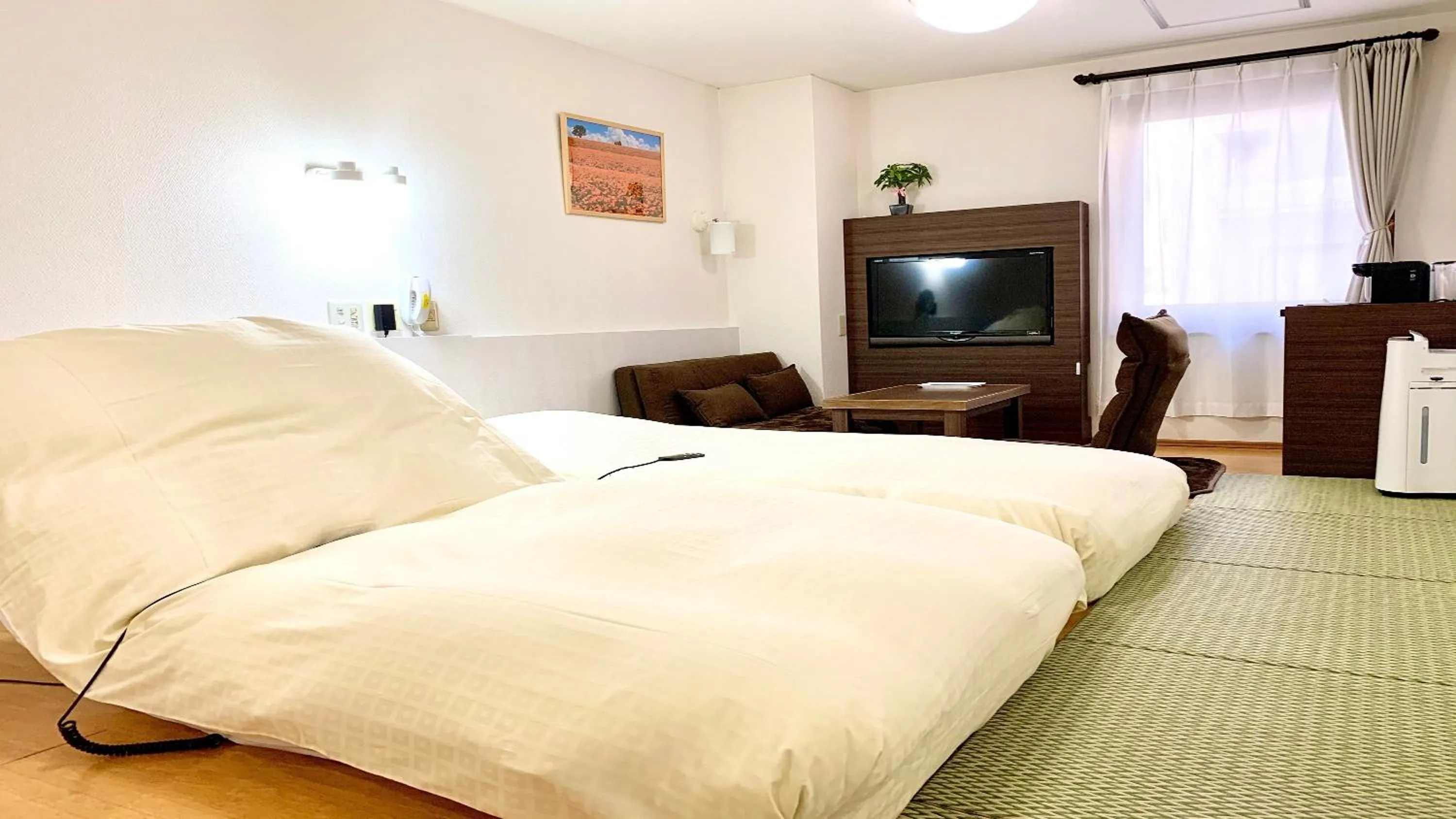 Bed in Business Hotel Raicho