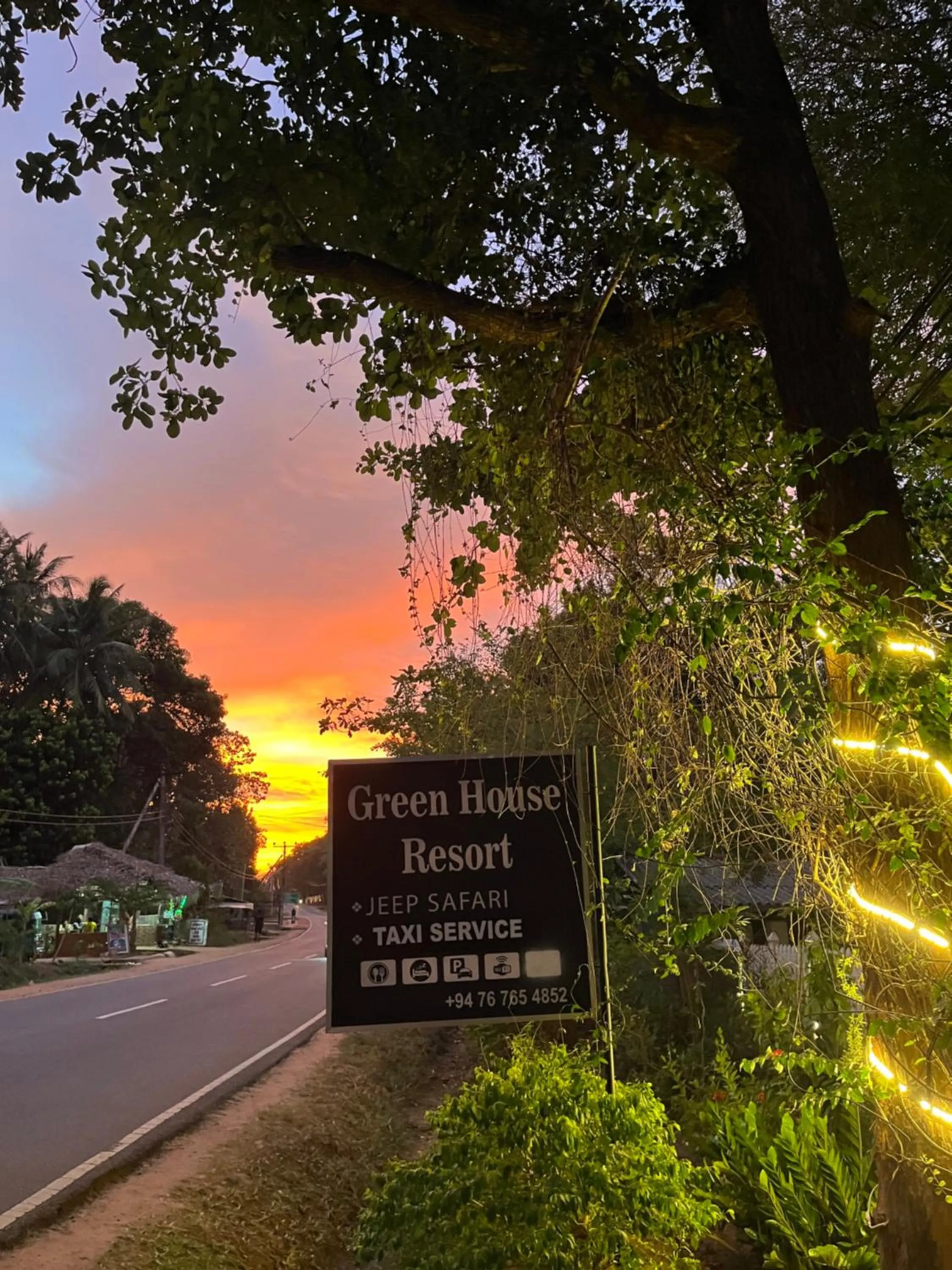 Property logo or sign in Green House Resort