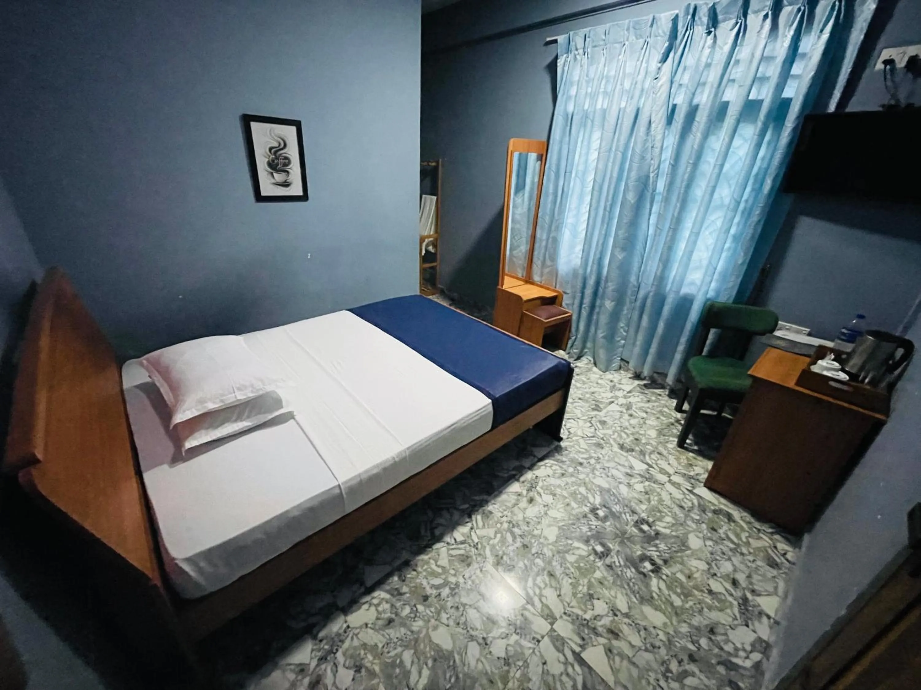 Bed in Nilaveli Hybrid Holiday Hotel