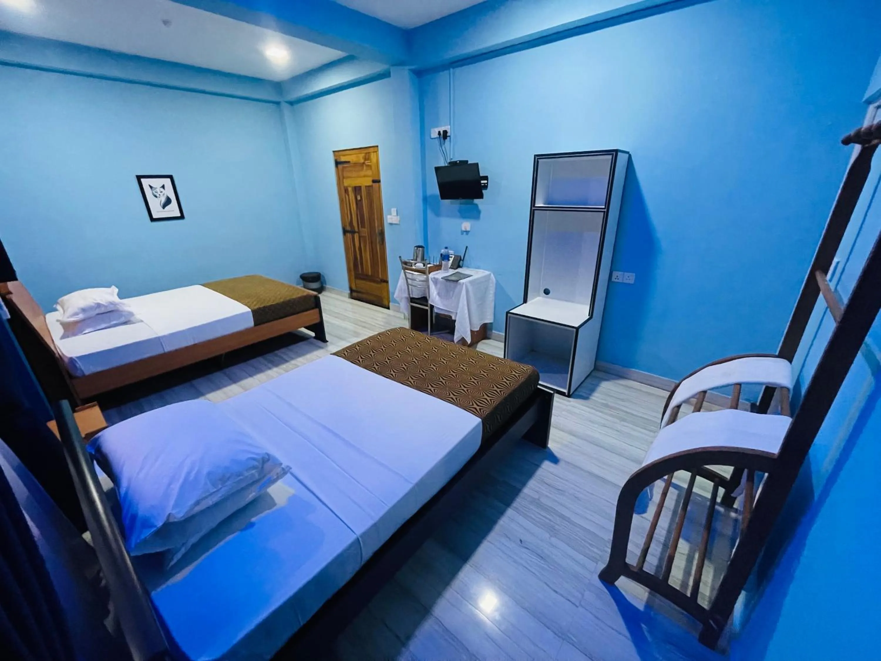 Bed in Nilaveli Hybrid Holiday Hotel