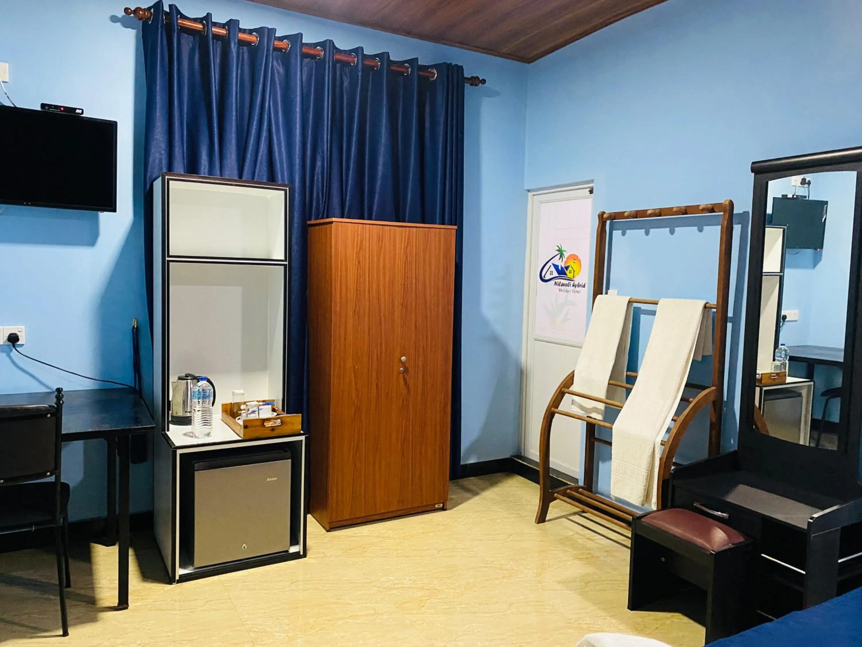 Bed in Nilaveli Hybrid Holiday Hotel