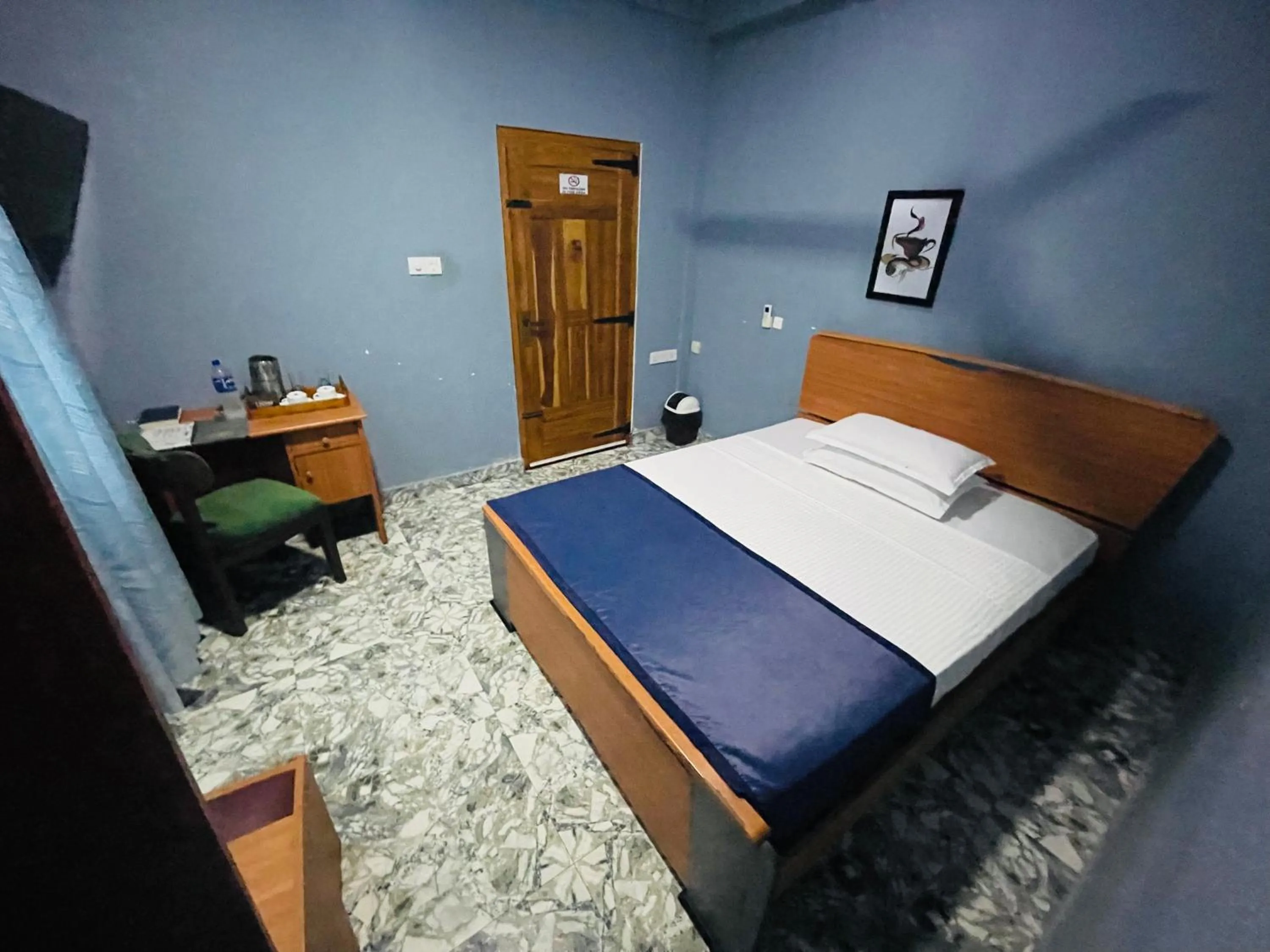 Bed in Nilaveli Hybrid Holiday Hotel