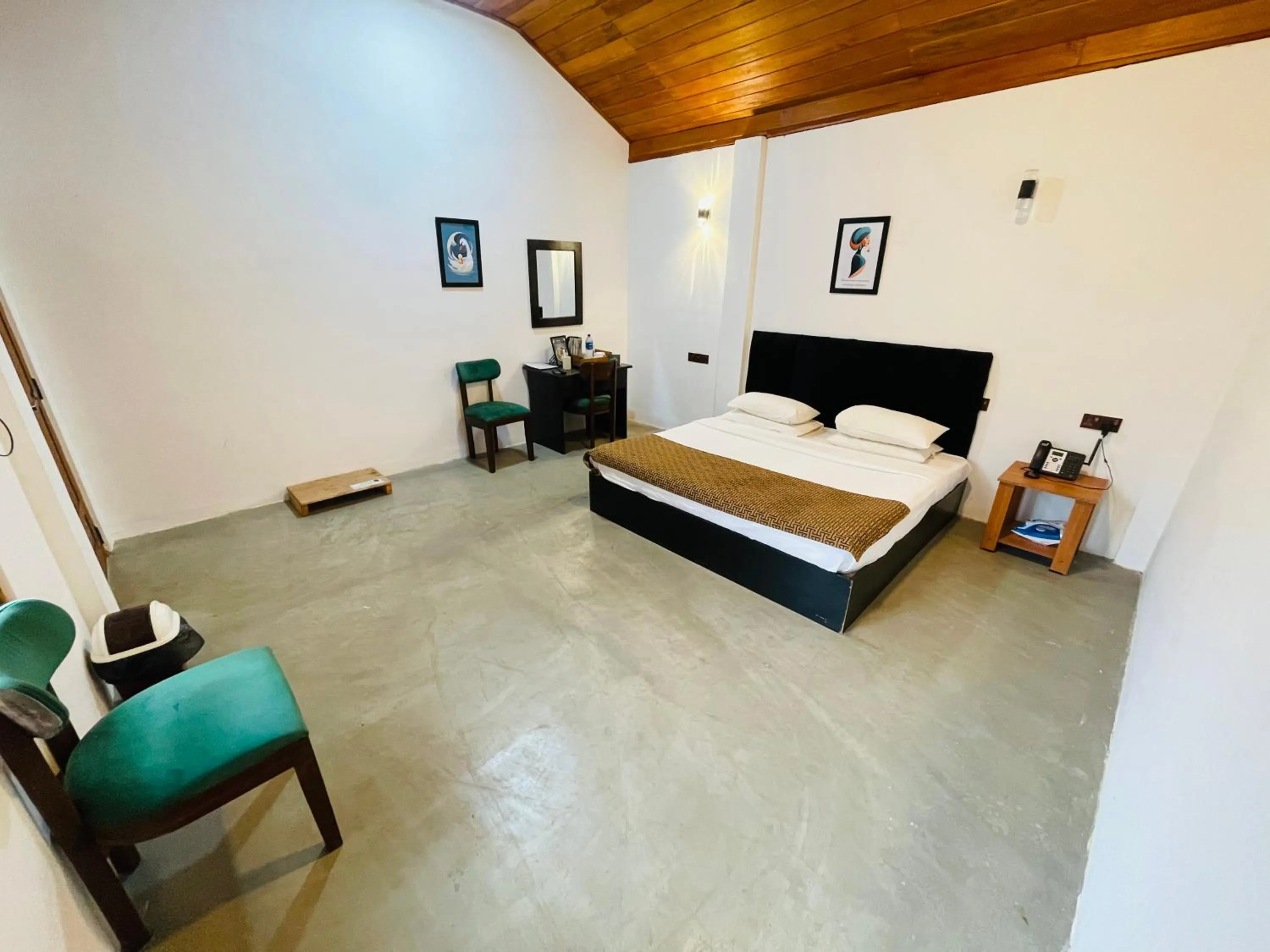 Bed in Nilaveli Hybrid Holiday Hotel