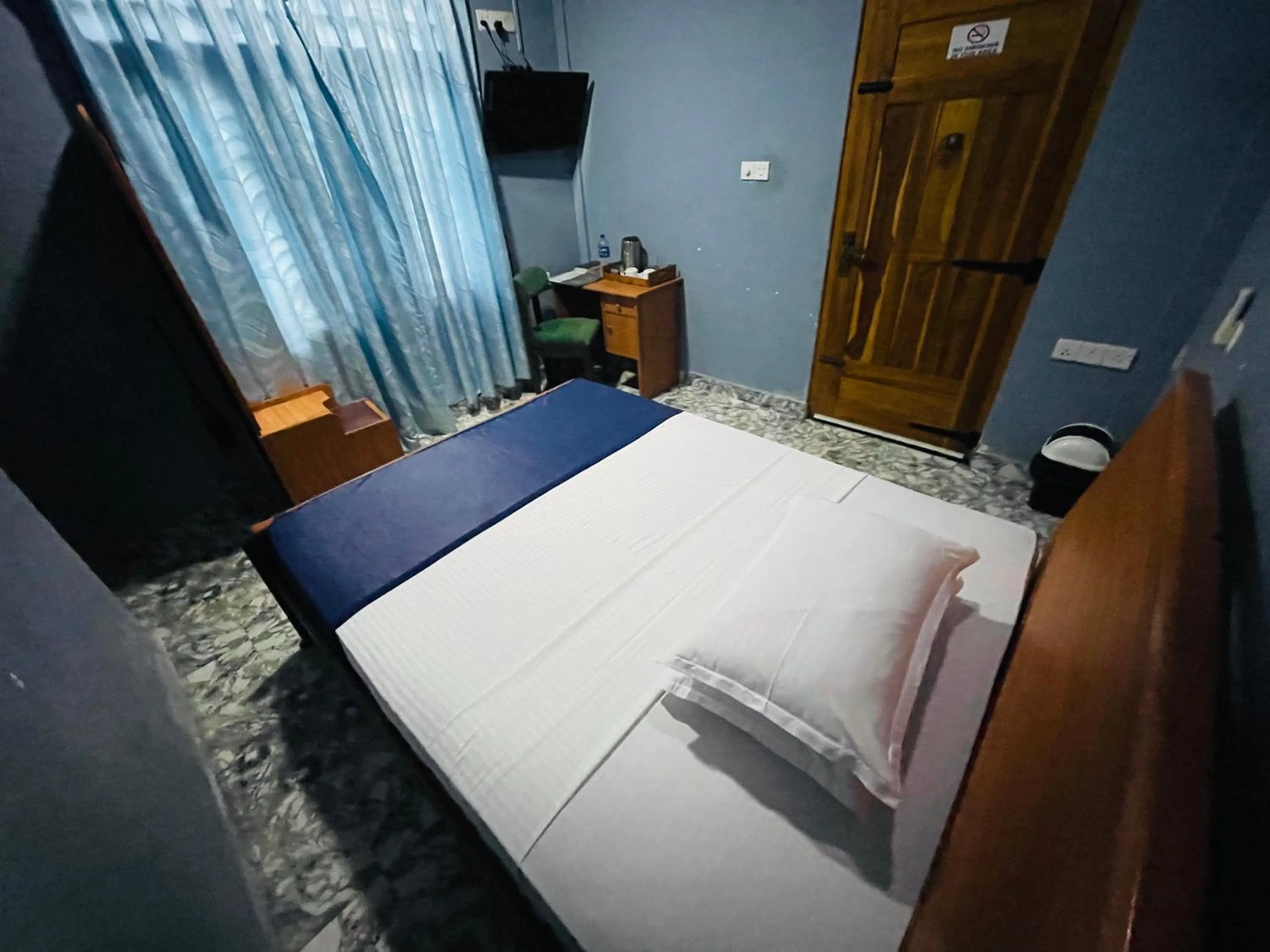 Bed in Nilaveli Hybrid Holiday Hotel