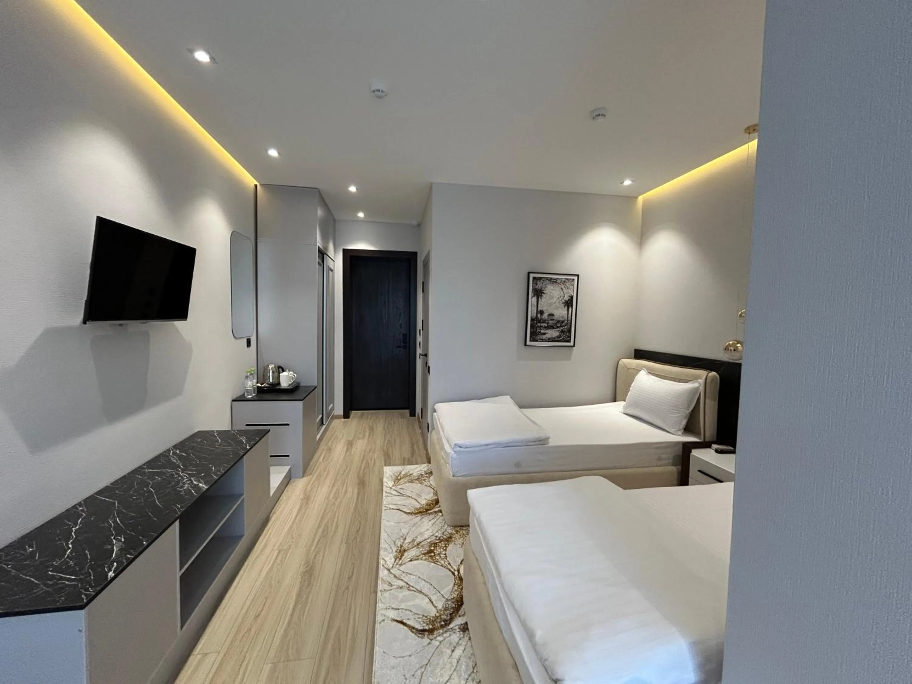 TV and multimedia, Bed in Karim Parkside Hotel