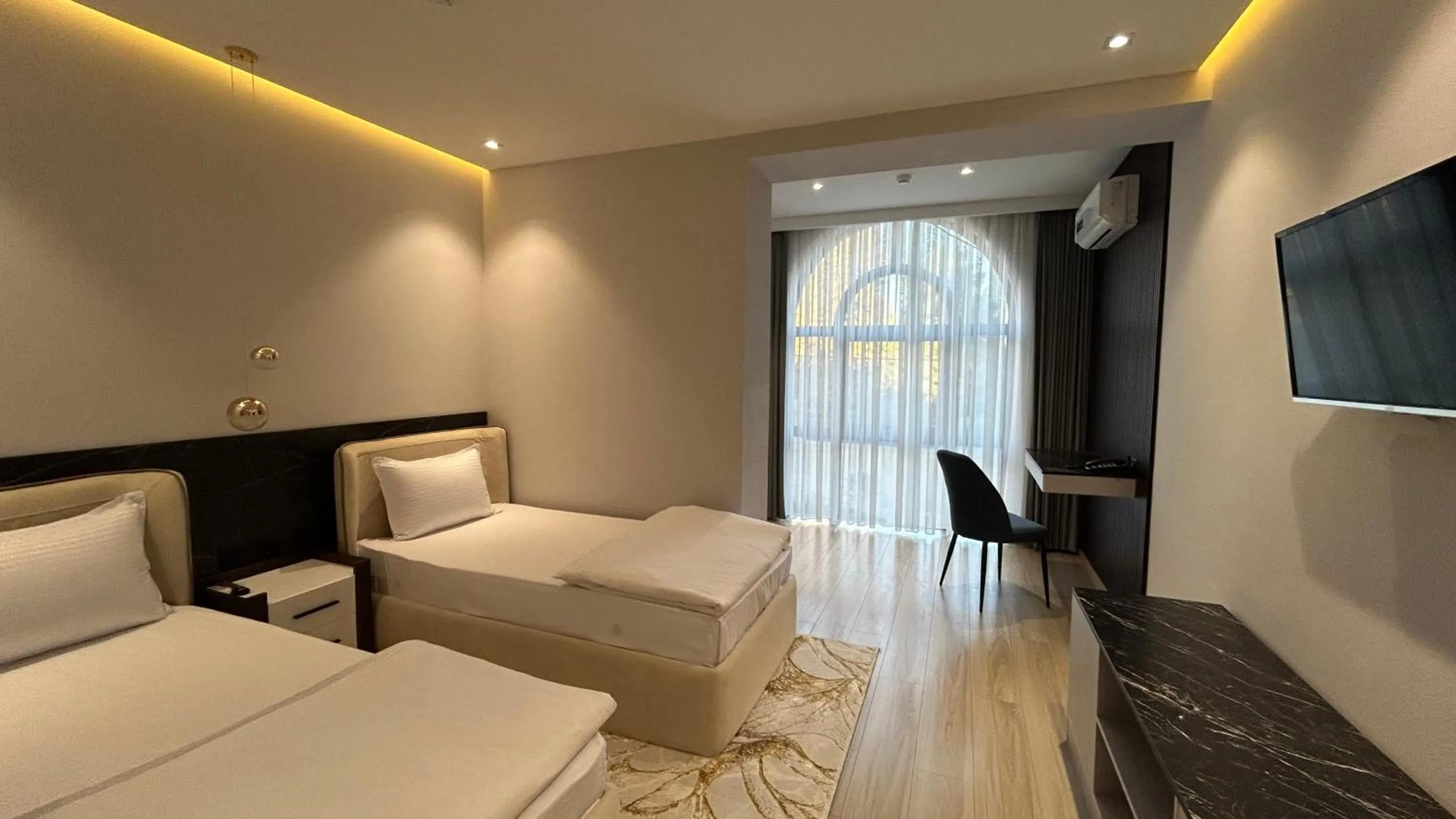 Photo of the whole room, Bed in Karim Parkside Hotel