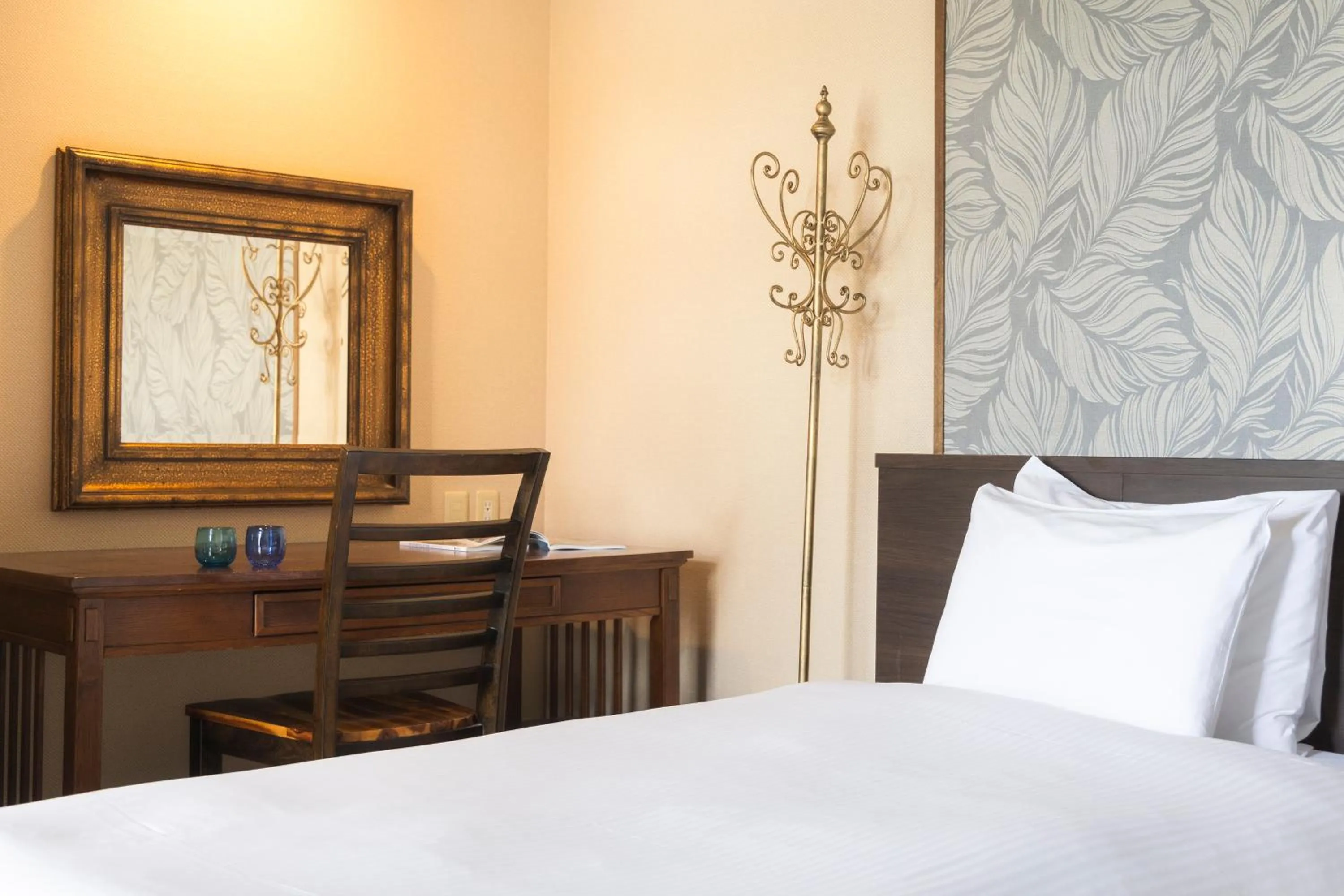 Bed in La Casa Panacea Okinawa Resort