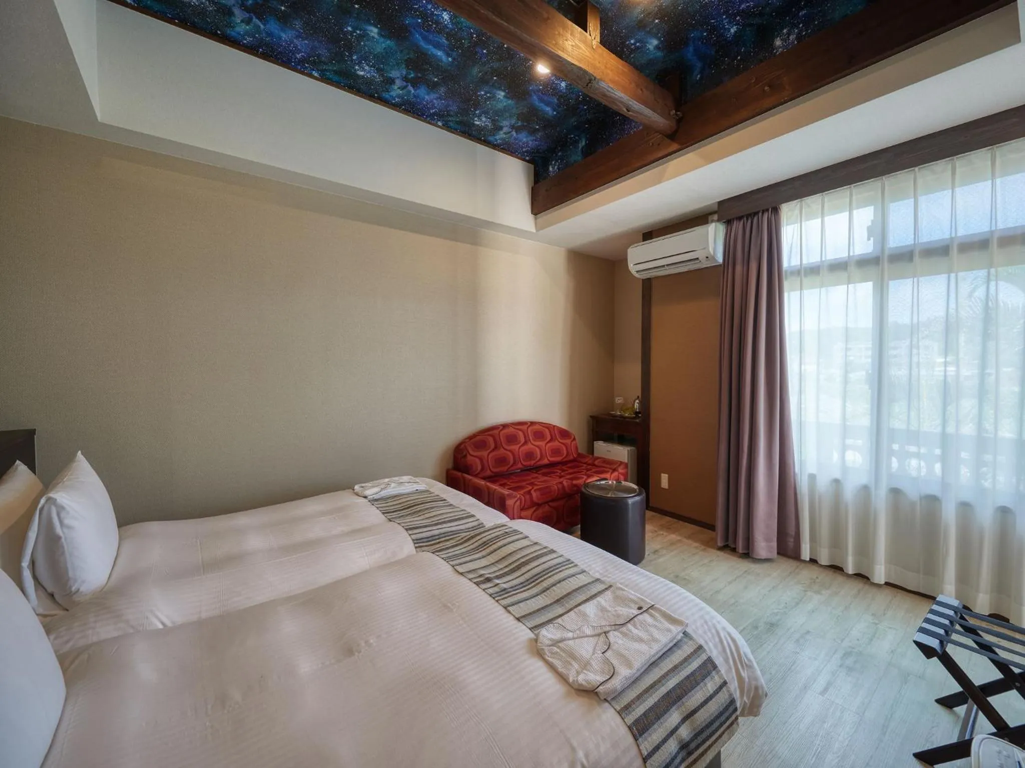 Photo of the whole room, Bed in La Casa Panacea Okinawa Resort