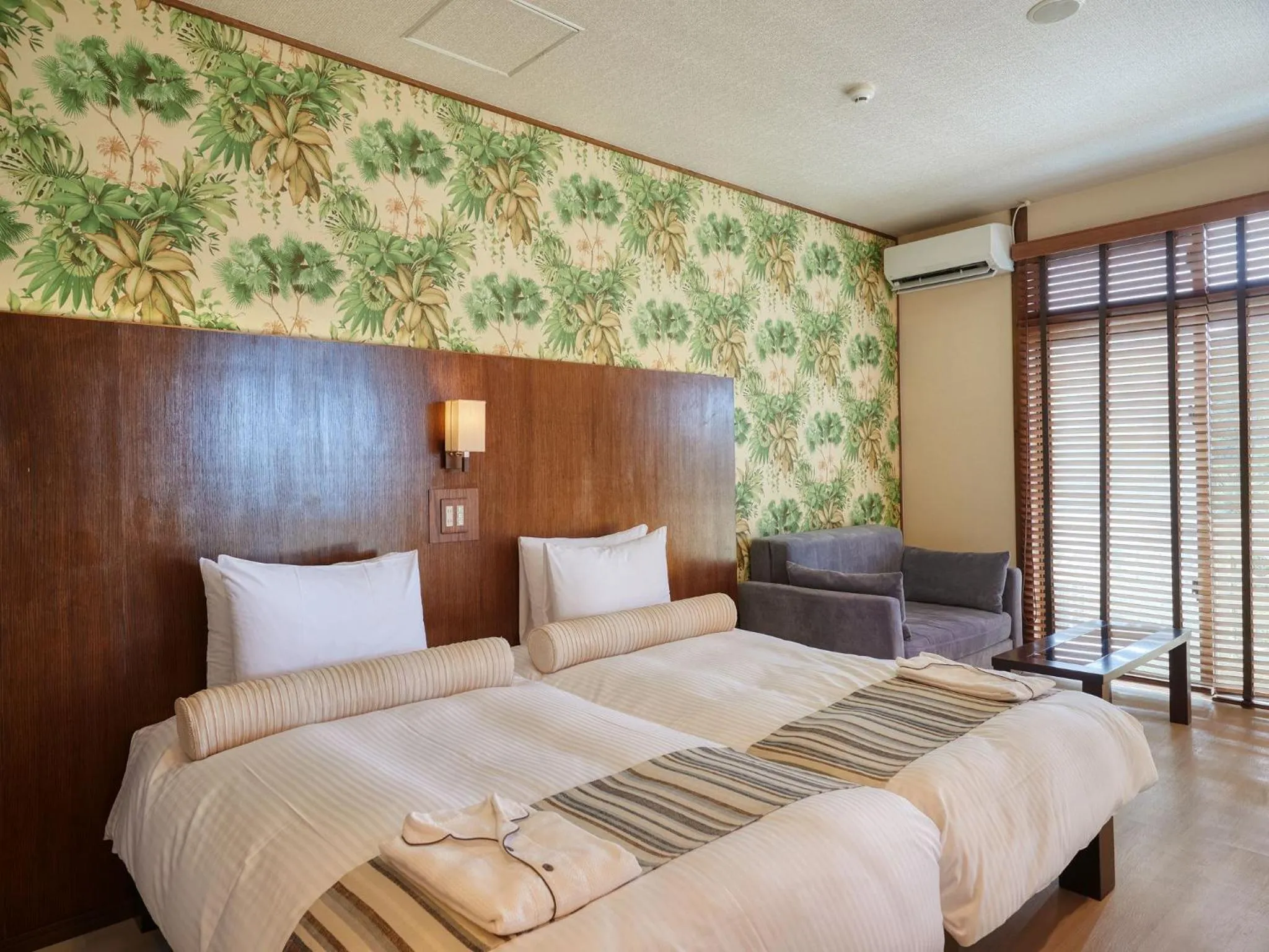 Photo of the whole room, Bed in La Casa Panacea Okinawa Resort