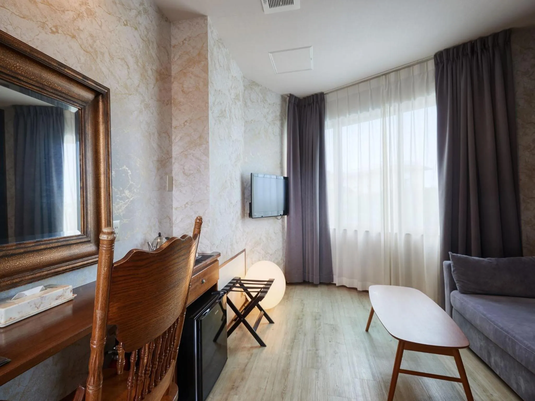 Seating area in La Casa Panacea Okinawa Resort