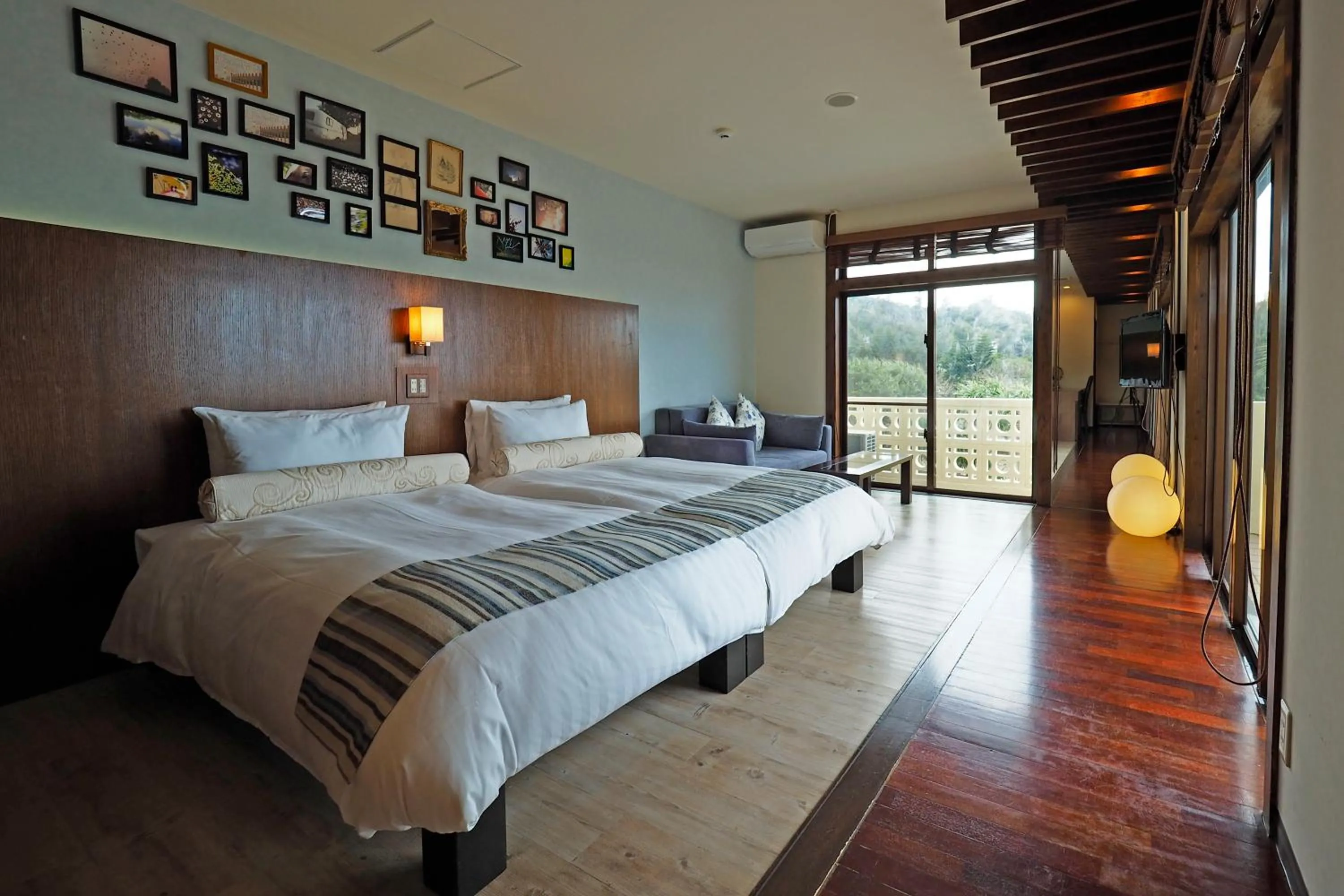 Bed in La Casa Panacea Okinawa Resort