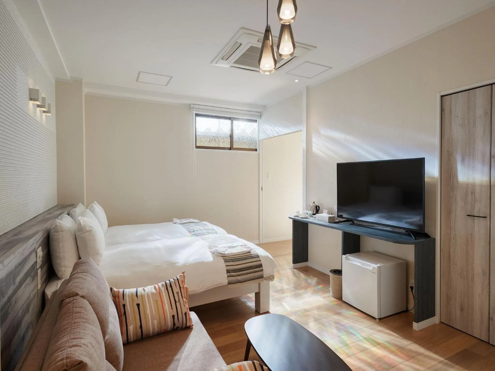 Photo of the whole room, Bed in La Casa Panacea Okinawa Resort