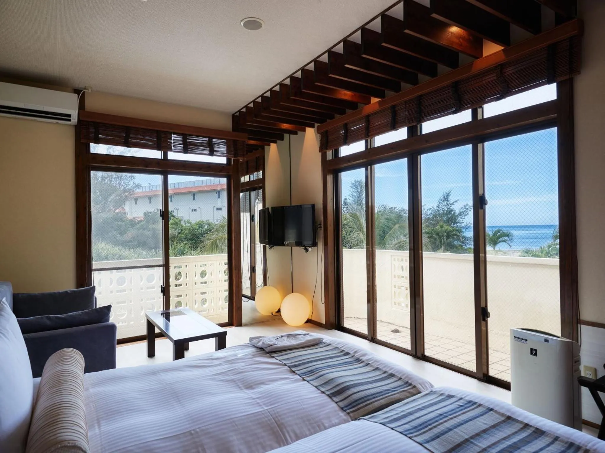 Photo of the whole room, Bed in La Casa Panacea Okinawa Resort