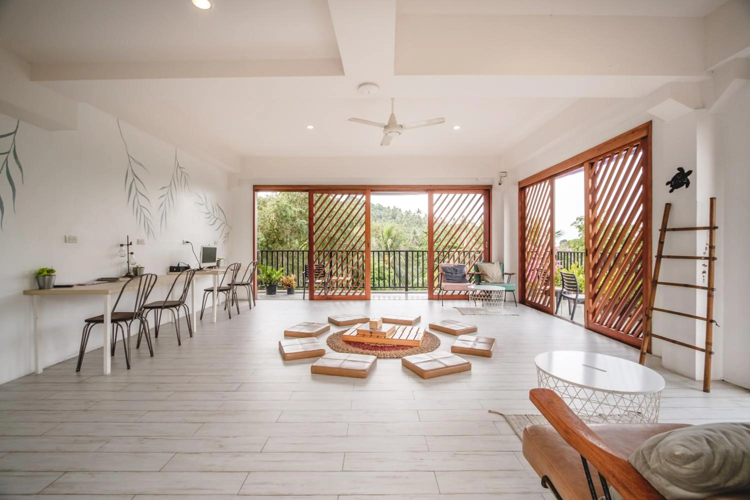 Communal lounge/ TV room in The Dearly Koh Tao Hostel-PADI 5 Star Dive Resort