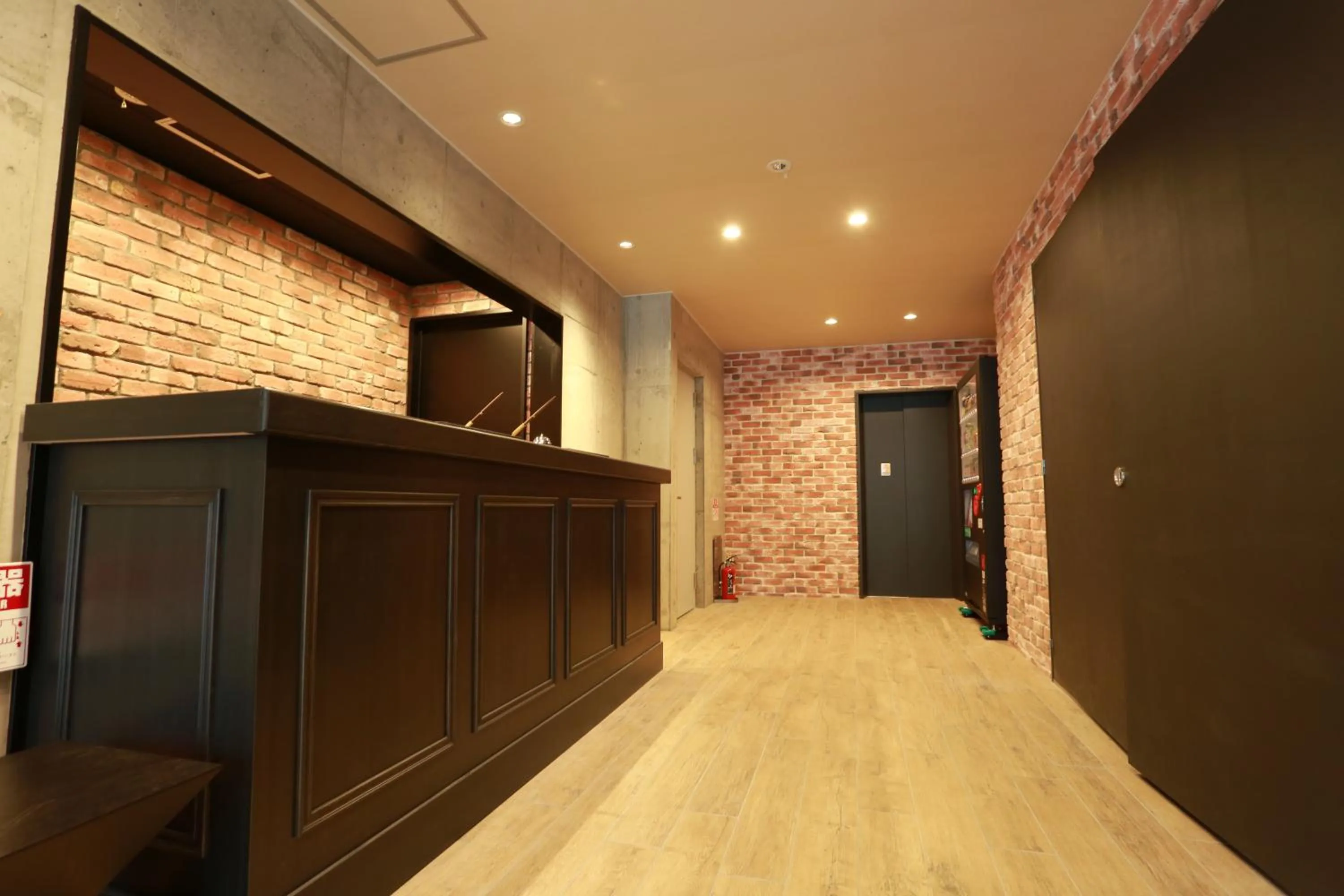 Lobby or reception in The Base Sakai Higashi Apartment Hotel