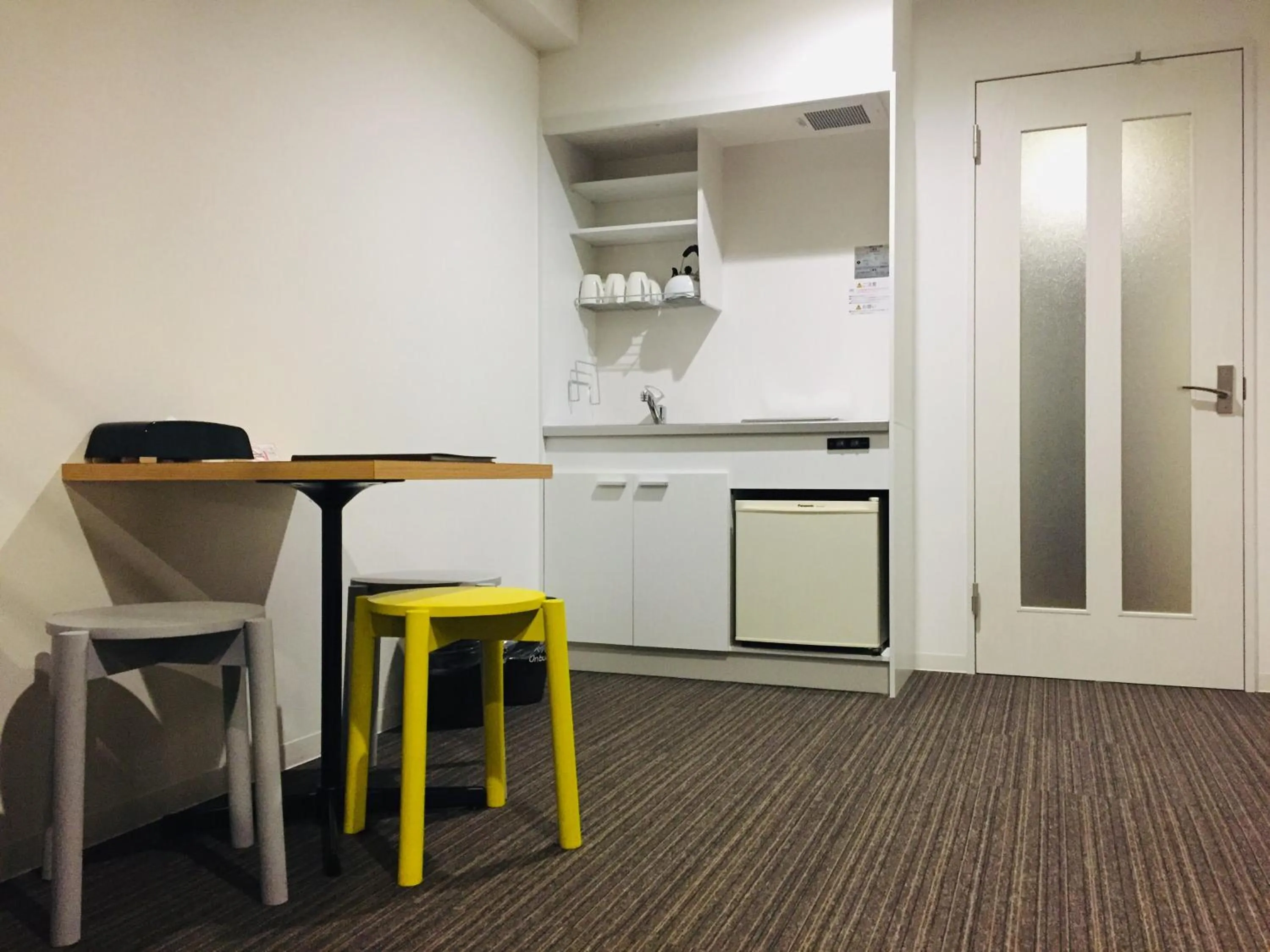 Kitchen or kitchenette in The Base Sakai Higashi Apartment Hotel