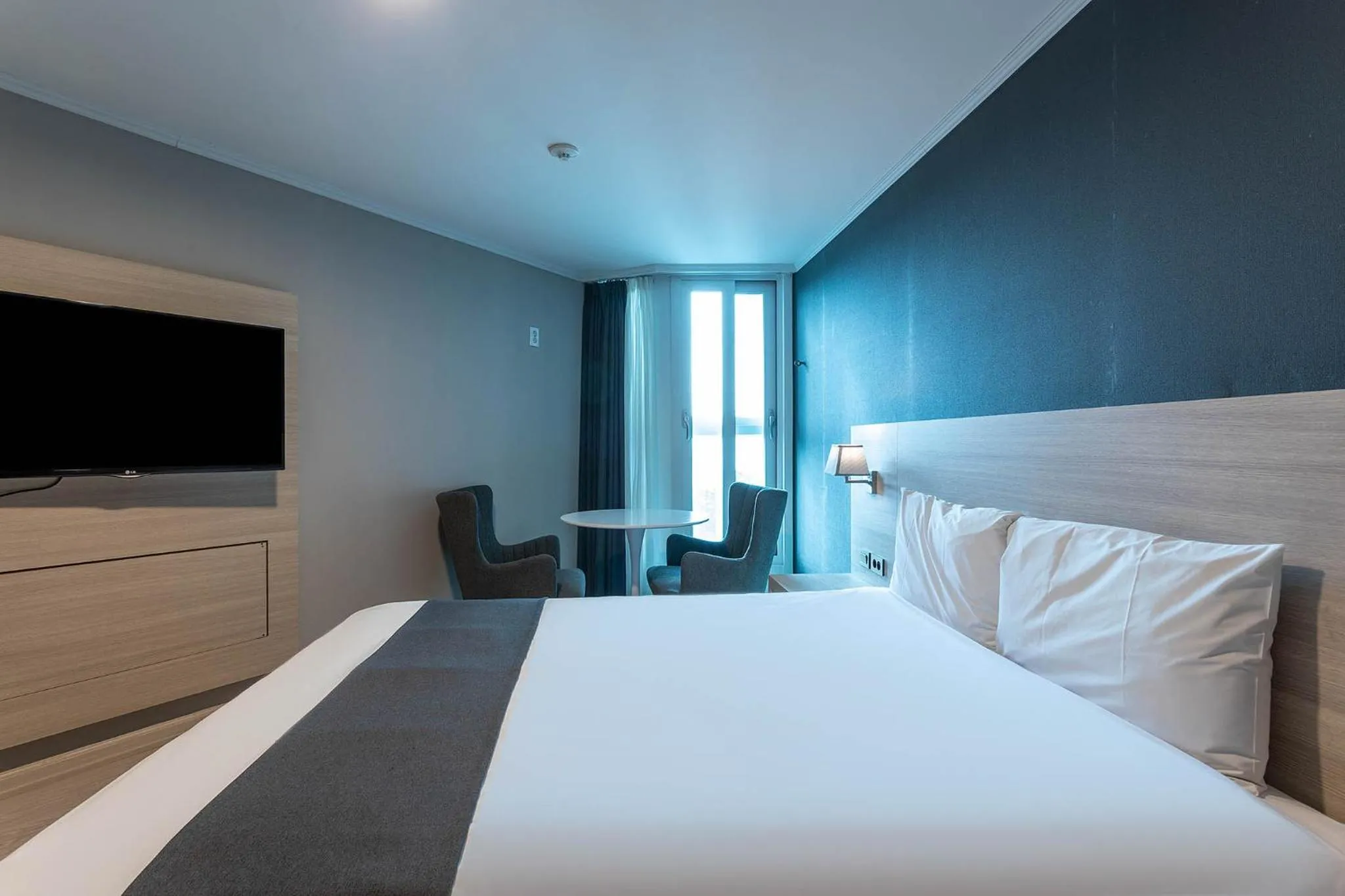 Bed in Gyeongpo Soo Hotel