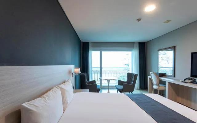 Bed in Gyeongpo Soo Hotel
