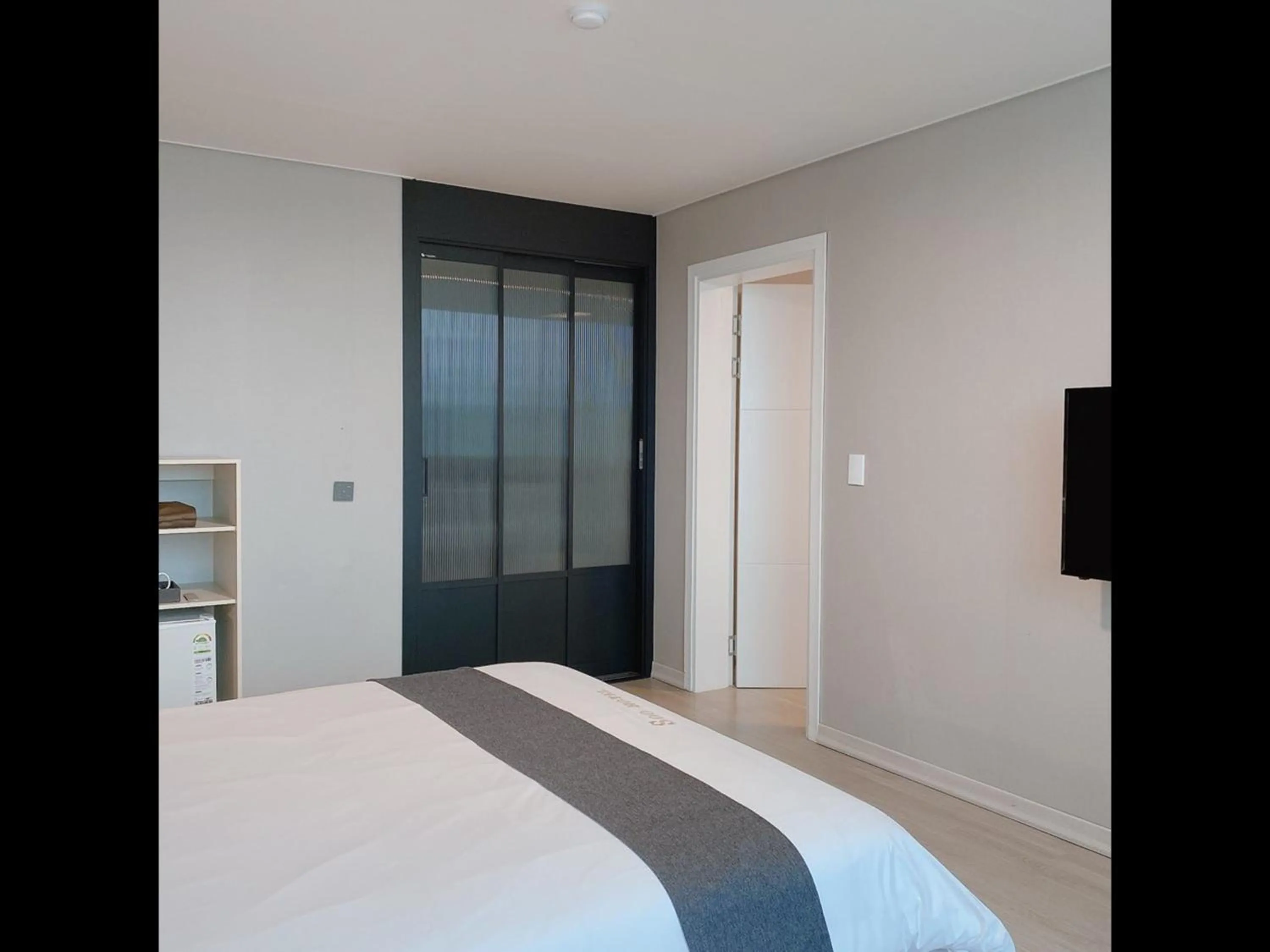 Bed in Gyeongpo Soo Hotel