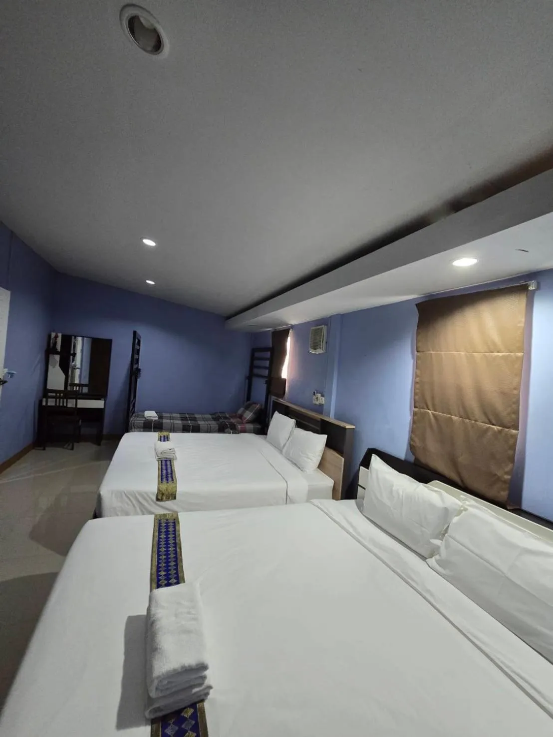 Bed in Baan Asree homestayบ้านอัสรี