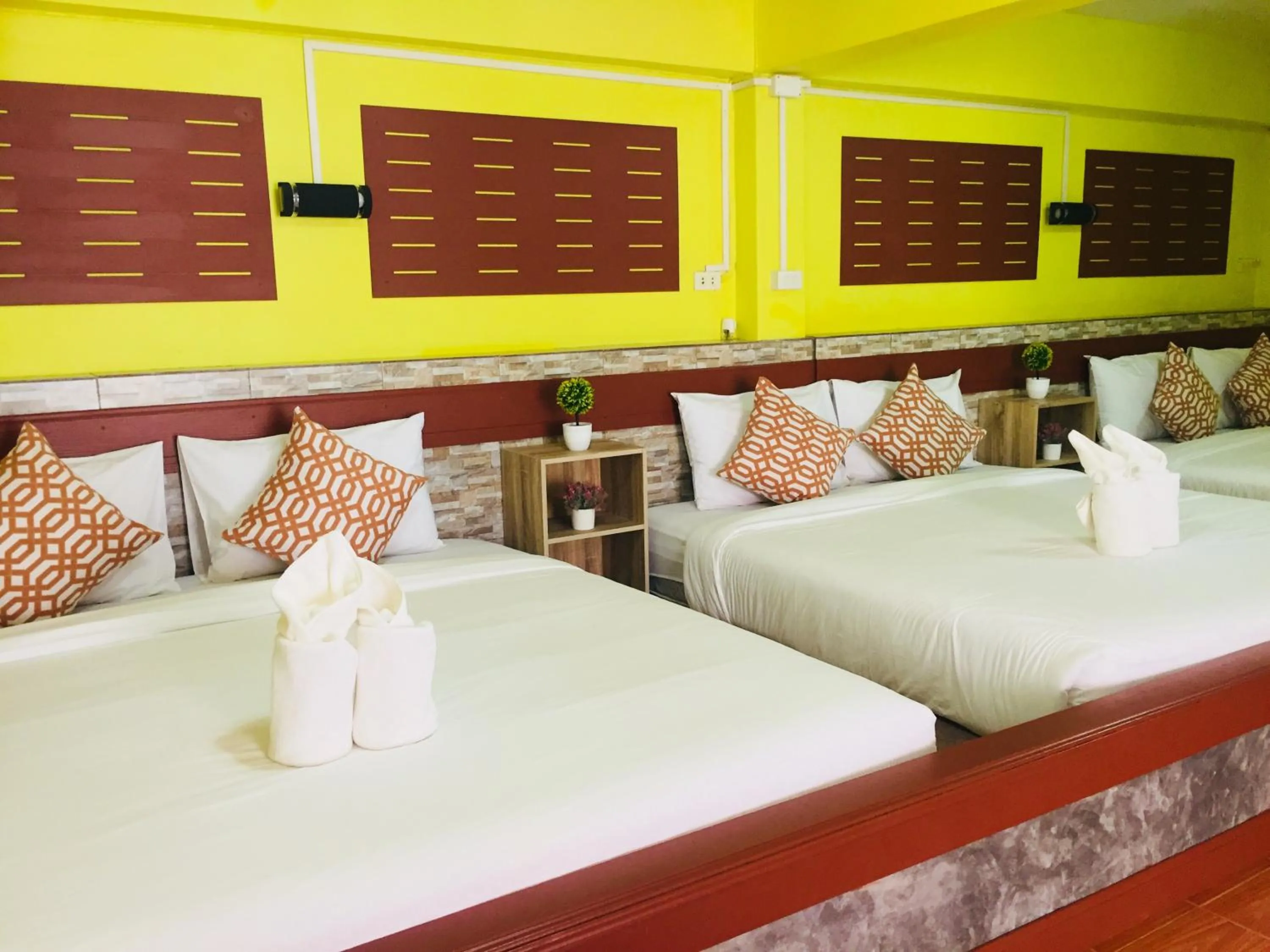 Bed in Baan Asree homestayบ้านอัสรี