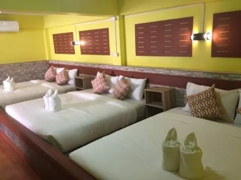 Bed in Baan Asree homestayบ้านอัสรี