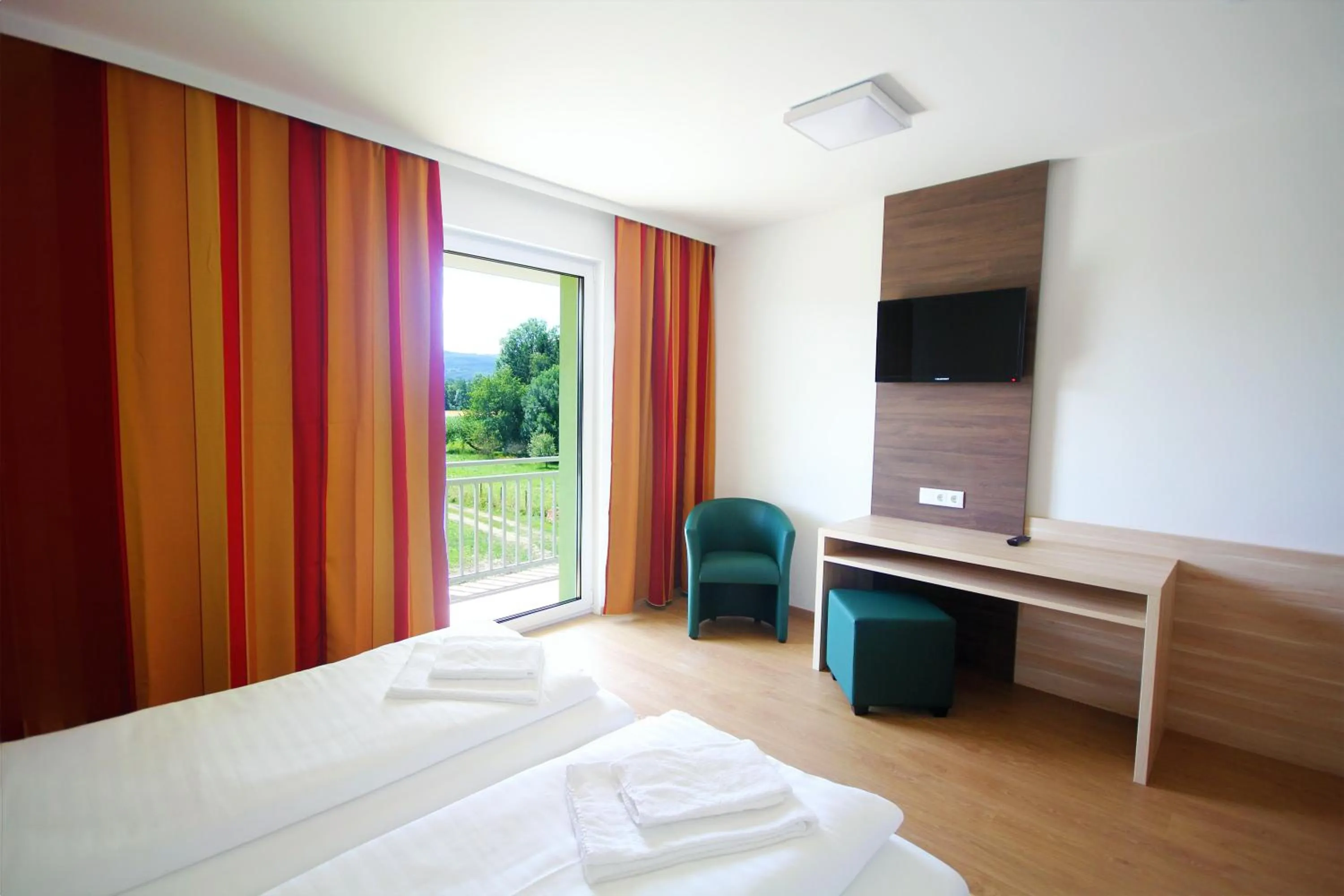 Photo of the whole room, Bed in Dorfgasthof Berlakovich