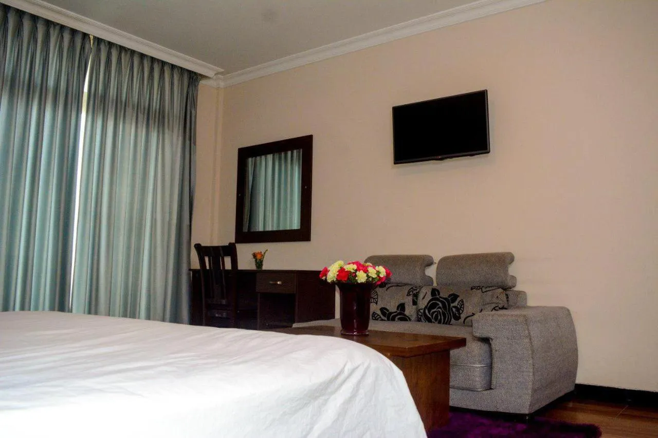 Bed in Melodie Hotel