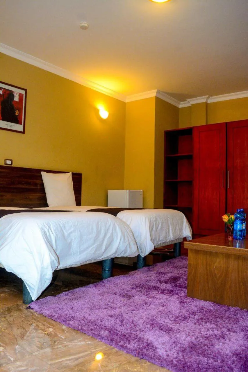 Bed in Melodie Hotel