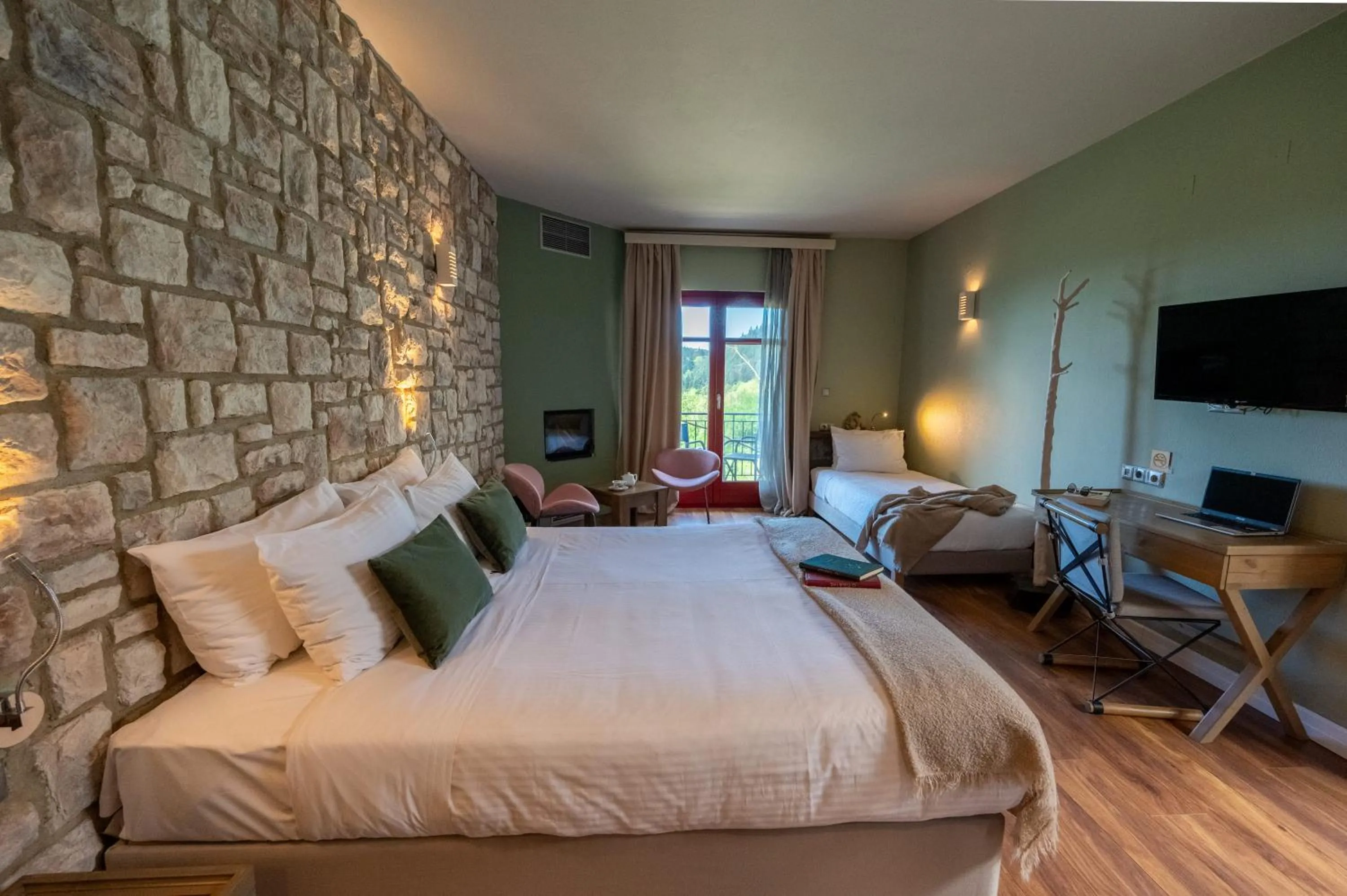 Bed in Rouista Tzoumerka Resort