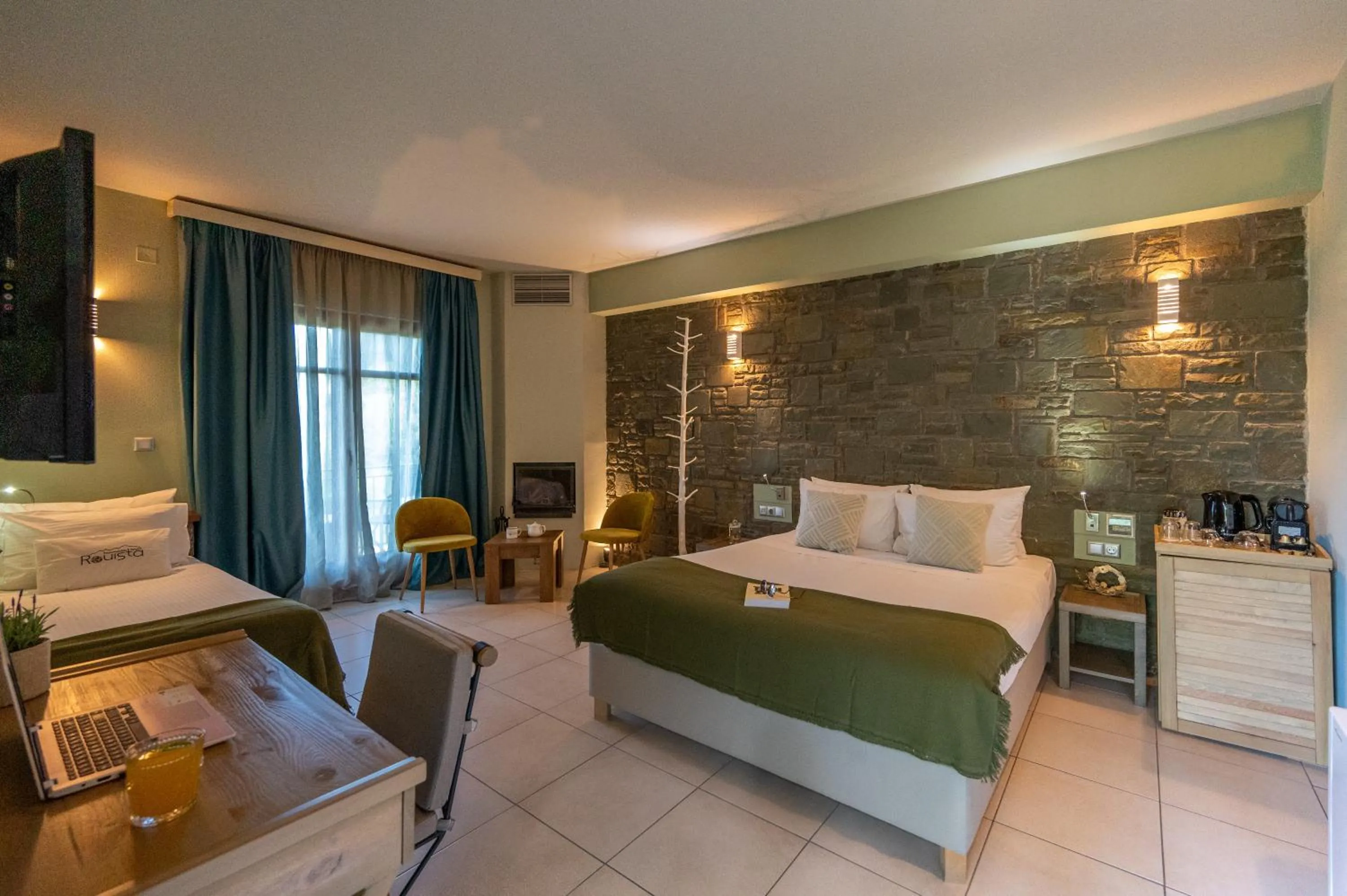 Photo of the whole room, Bed in Rouista Tzoumerka Resort