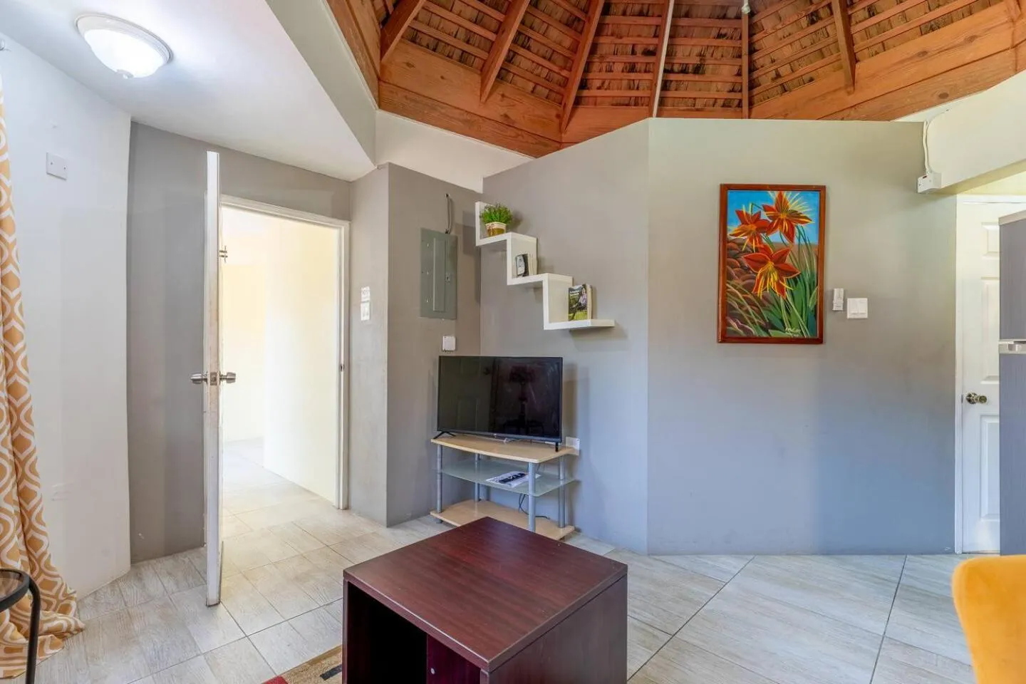 Communal lounge/ TV room in Seacastles by the beach/pool