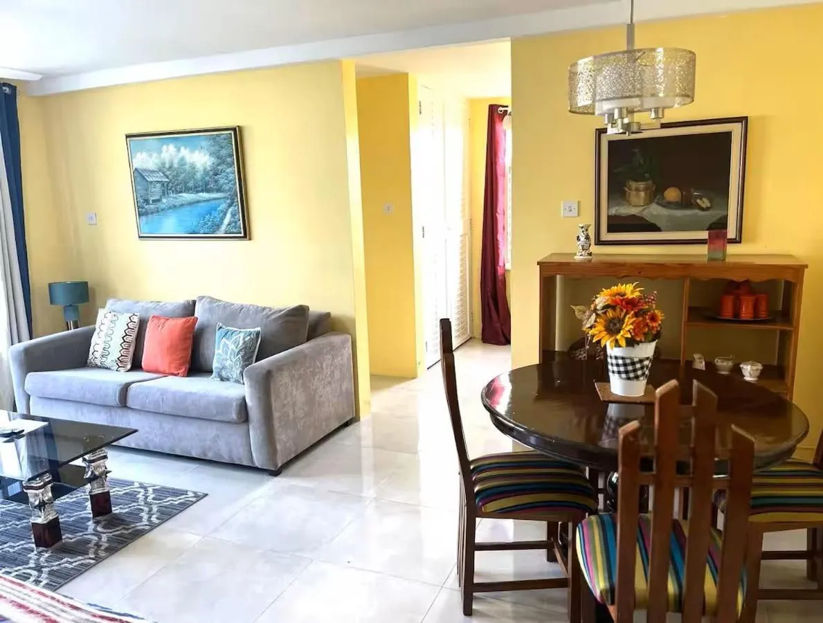 Communal lounge/ TV room in Seacastles by the beach/pool