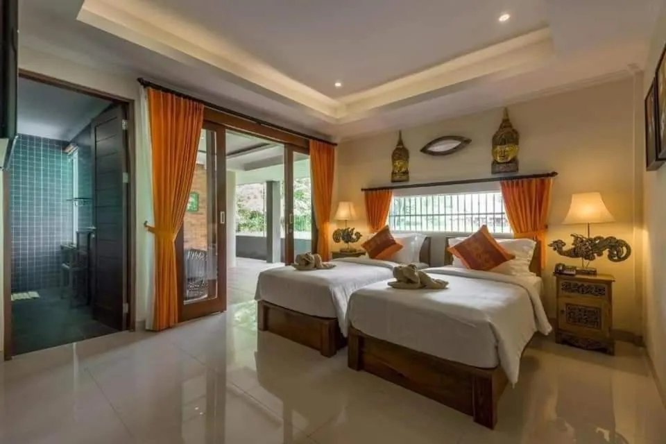 Bed in Gefecon Villa Ubud