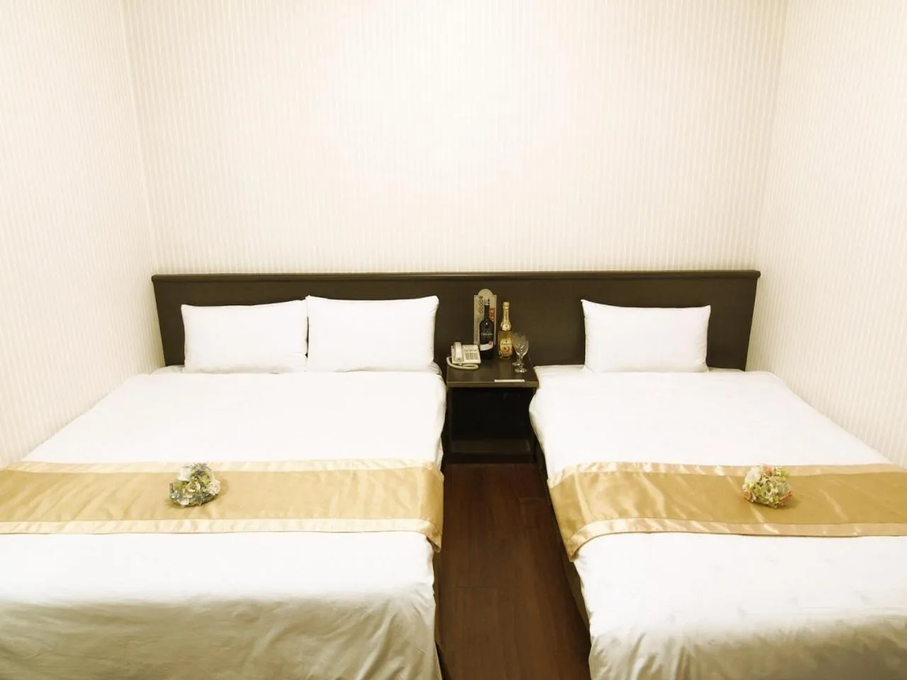 Bed in Yi Pin Yuan Hotel