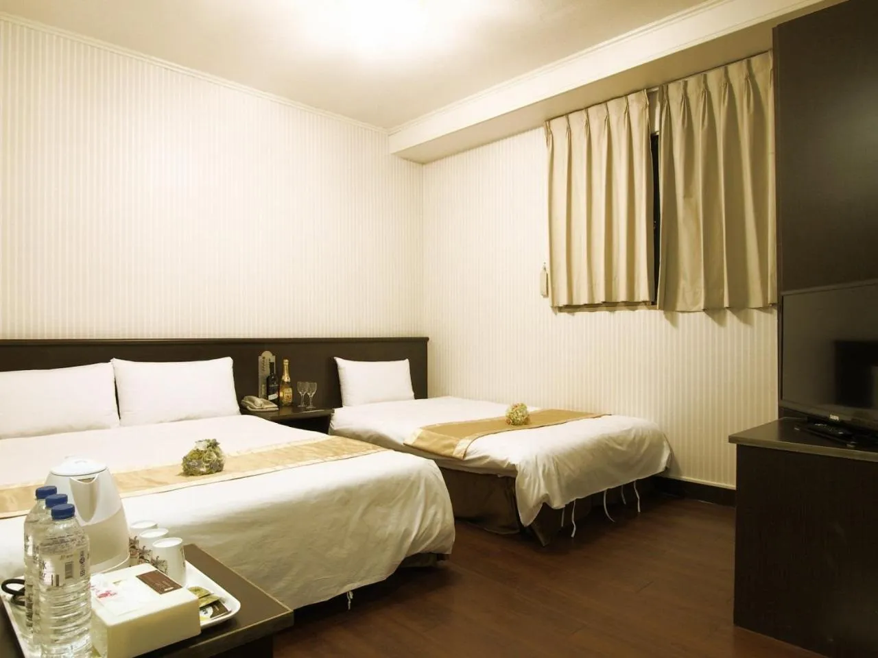 Bed in Yi Pin Yuan Hotel